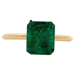 Green emerald engagement ring 18k yellow gold
