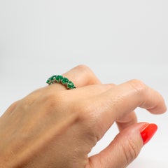 Green Emerald Eternity Band in Platinum