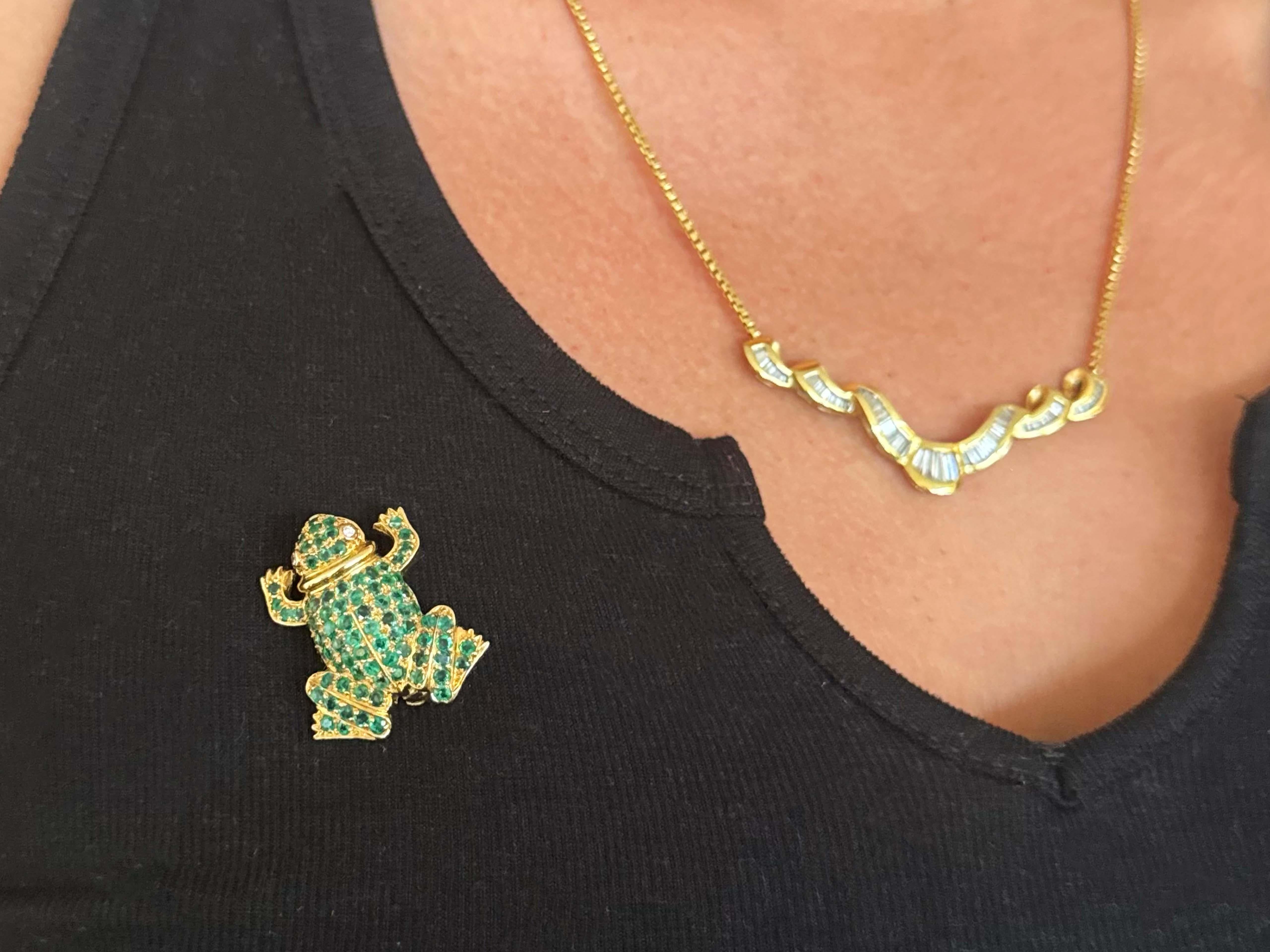 Add a touch of nature-inspired luxury to your collection with this exquisite Green Emerald Frog Brooch. Crafted in 18K solid yellow gold, this stunning piece features approximately 1.50-2.00 carats of vivid green emeralds set in a beautifully