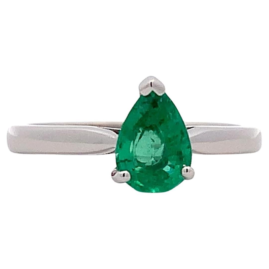 Green emerald pear shaped solitaire engagement ring 18k white gold