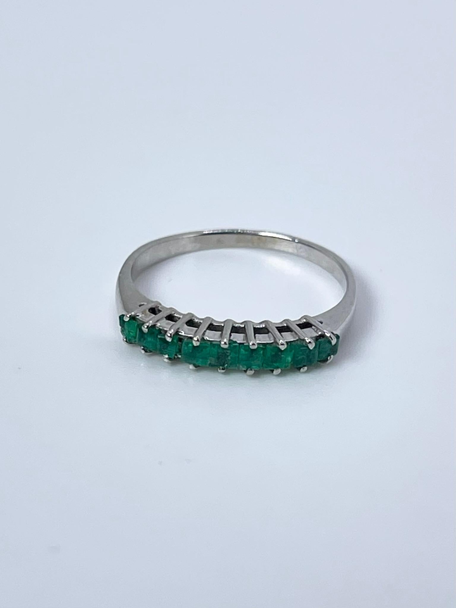 Elegant emerald wedding band in 14KT white gold.
ITEM: OO 200-00042
GRAM WEIGHT: 2.34gr
GOLD: 14KT white gold
NATURAL EMERALDS
Cut: Princess
Color: Green
Clarity: Moderately Included
Carat:0.20ct
SIZE: 7 (can be re-sized)


WHAT YOU GET AT STAMPAR