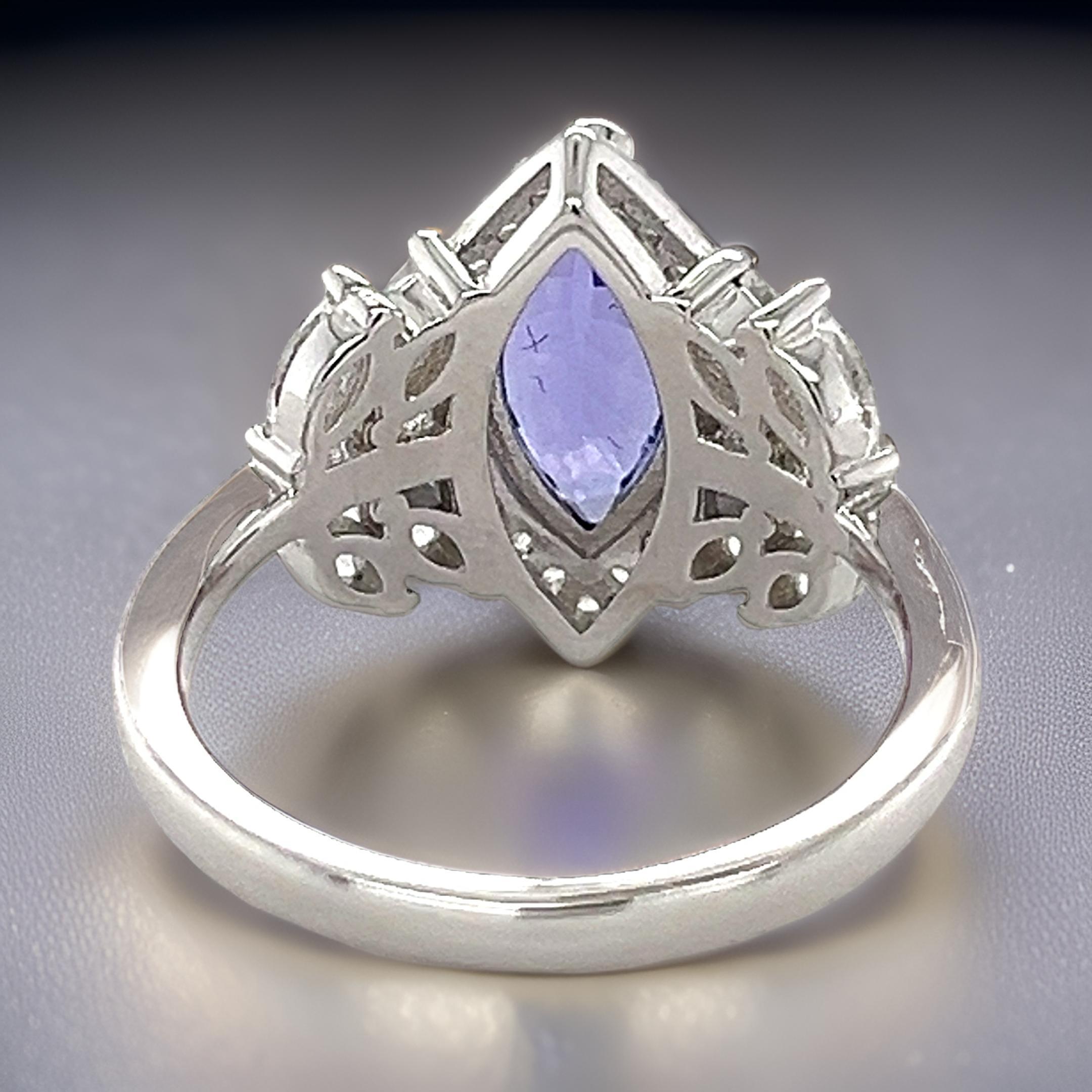 AAAA Tanzanite Halo Ring in Platinum Plated Sterling Silver Tanzanite Ring In New Condition For Sale In New York, NY