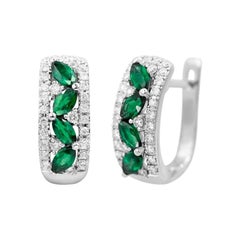 Orecchini a leva moderni in oro bianco con smeraldo verde e diamante bianco