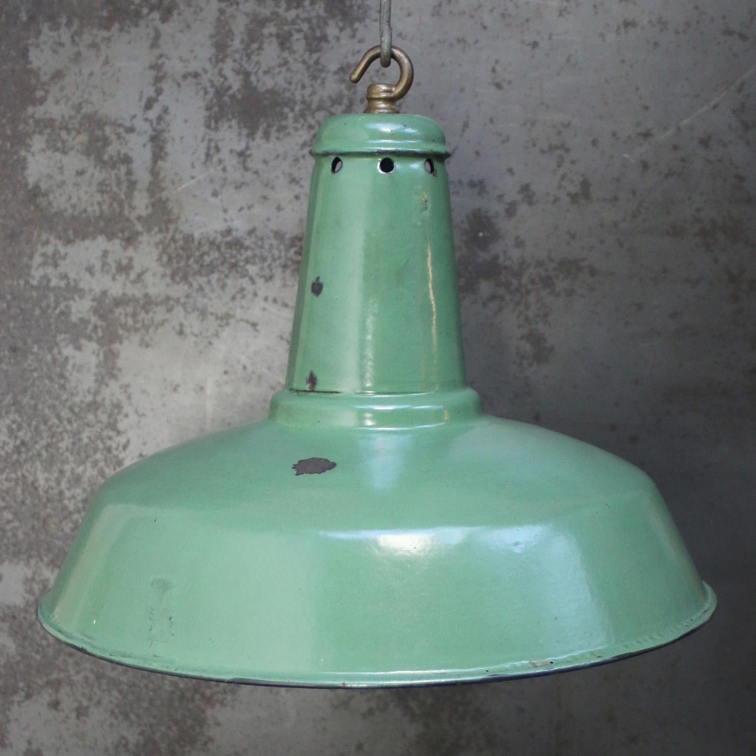 Rare Green French Enamel Factory Pendant Light
Thick quality Enamel.
Used in warehouses and factories. 

Weight: 2.00 kg / 4.4 lb

Priced per individual item. All lamps have been made suitable by international standards for incandescent light bulbs,