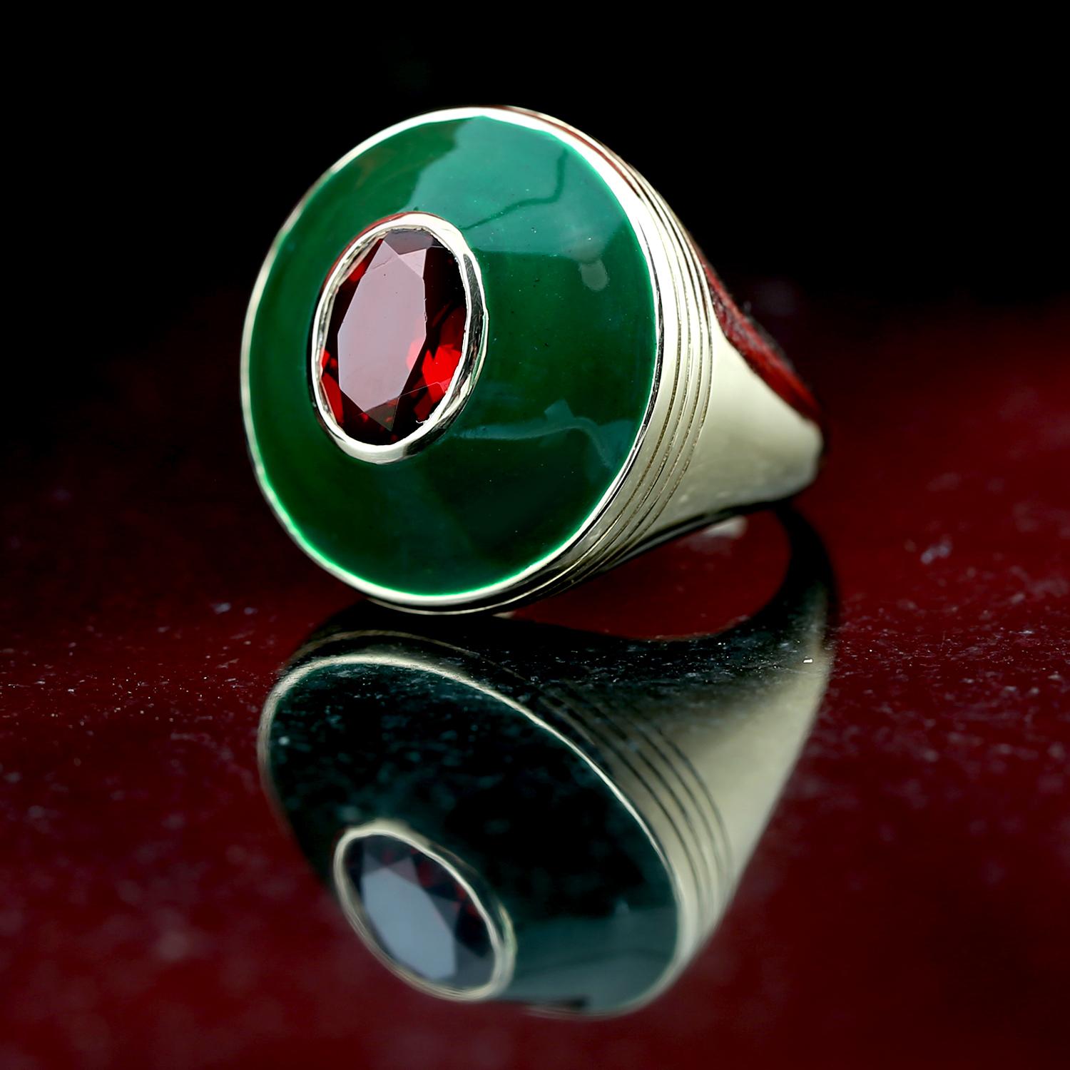 This ring has been meticulously crafted from 14-karat gold, green enamel and 3.1 carats of garnet.

The ring is a size 7 and may be resized to larger or smaller upon request. 
FOLLOW  MEGHNA JEWELS storefront to view the latest collection &