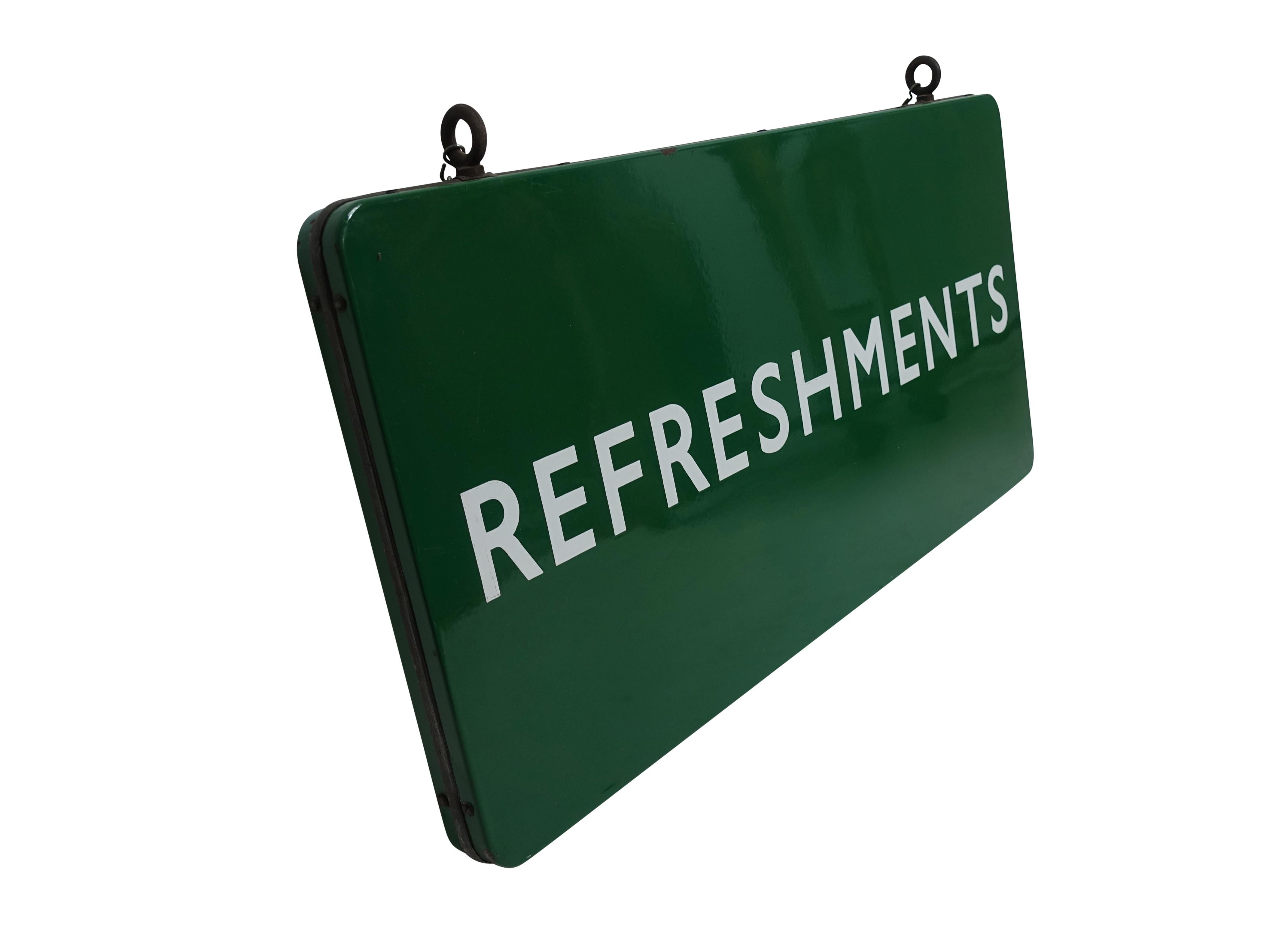 A double sided green enamel refreshments display sign with white enamel lettering. Most likely from a store or stadium, American, early to mid-20th century.