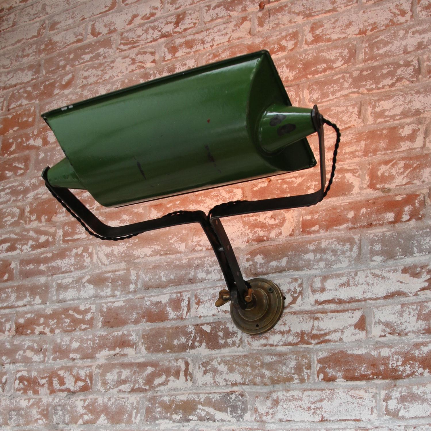 Large green enamel wall lamp scone made in the UK
Metal arm with brass wall plate
Adjustable in height and angle

2x E26 / E27

Measures: Diameter cast iron wall mount 10 cm.

Weight: 2.20 kg / 4.9 lb

Priced per individual item. All lamps have been