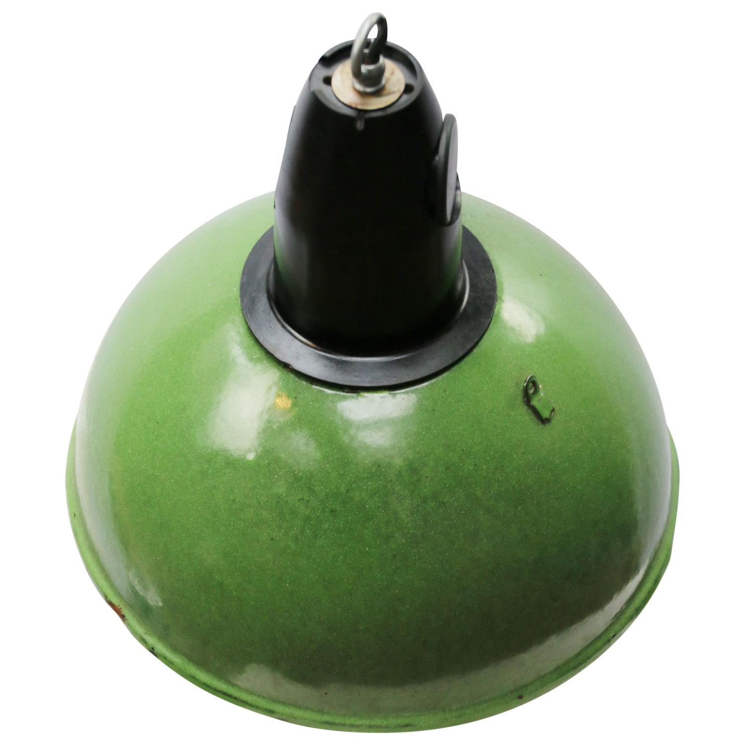 Vintage industrial lamp made of green enamel with Bakelite top. white interior

Weight: 1.50 kg / 3.3 lb

Priced per individual item. All lamps have been made suitable by international standards for incandescent light bulbs, energy-efficient and