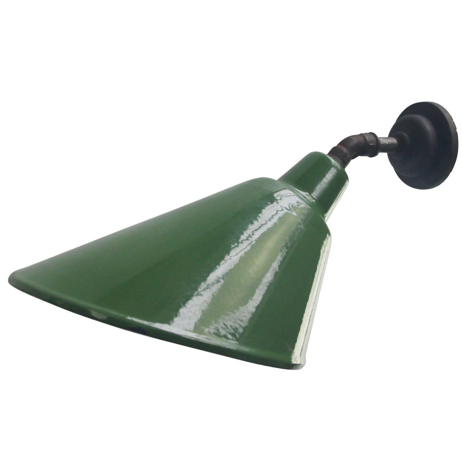 Factory wall light
Green enamel, white interior

Diameter cast iron wall piece: 10.5 cm / 4”.
2 holes to secure

Weight: 2.00 kg / 4.4 lb

Priced per individual item. All lamps have been made suitable by international standards for incandescent