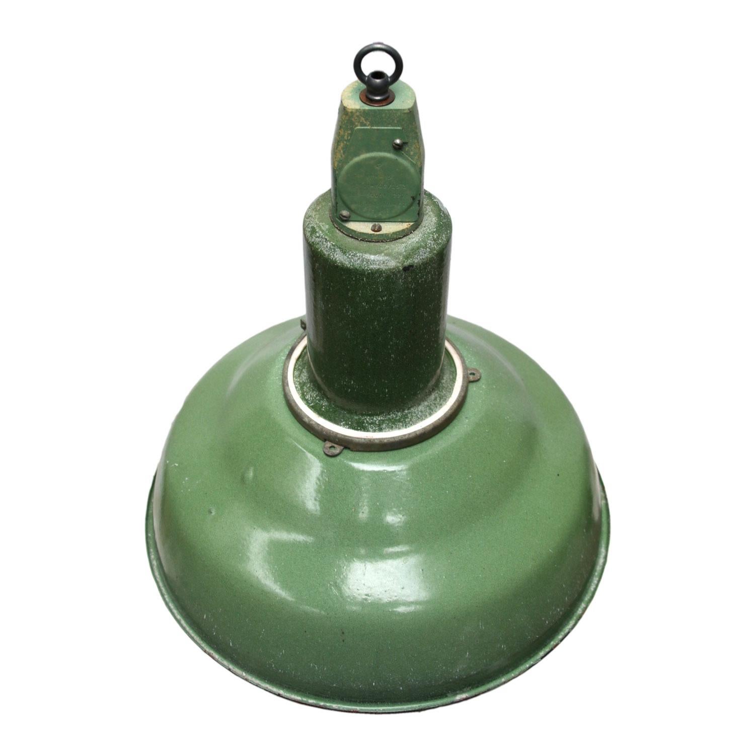 Enamel Industrial pendant
Light green enamel shade, white inside.
Green enamel top.

Weight: 2.70 kg / 6 lb

Priced per individual item. All lamps have been made suitable by international standards for incandescent light bulbs,