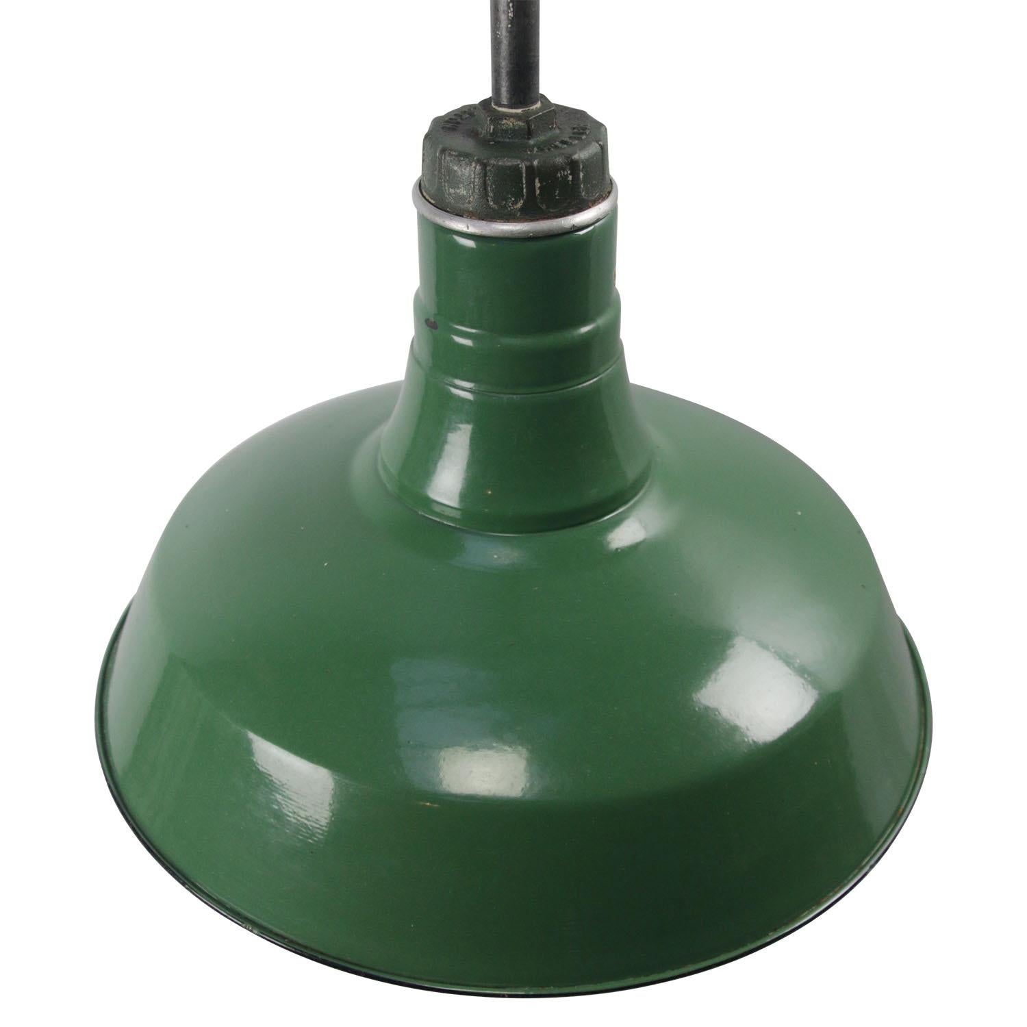 American industrial factory pendant light by Wheeler, Boston, USA.
Green enamel white interior.
Green Metal top with cast ion clamp

Weight 3.20 kg / 7.1 lb

Priced per individual item. All lamps have been made suitable by international