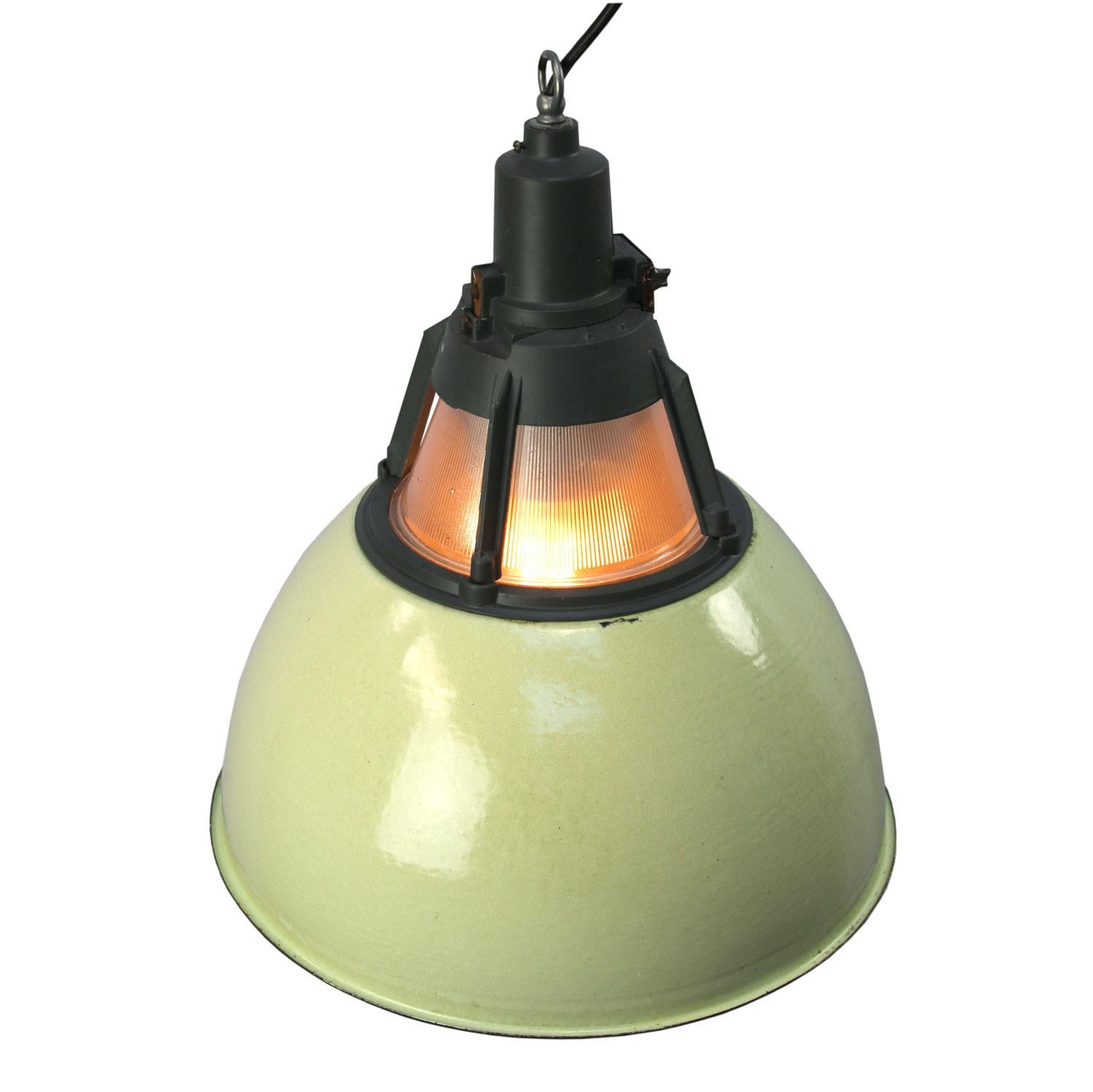 Enamel Industrial pendant.
Yellow green enamel shade, white inside.
Dark grey cast aluminium top with Holophane glass

Weight: 3.5 kg / 7.7 lb

Priced per individual item. All lamps have been made suitable by international standards for