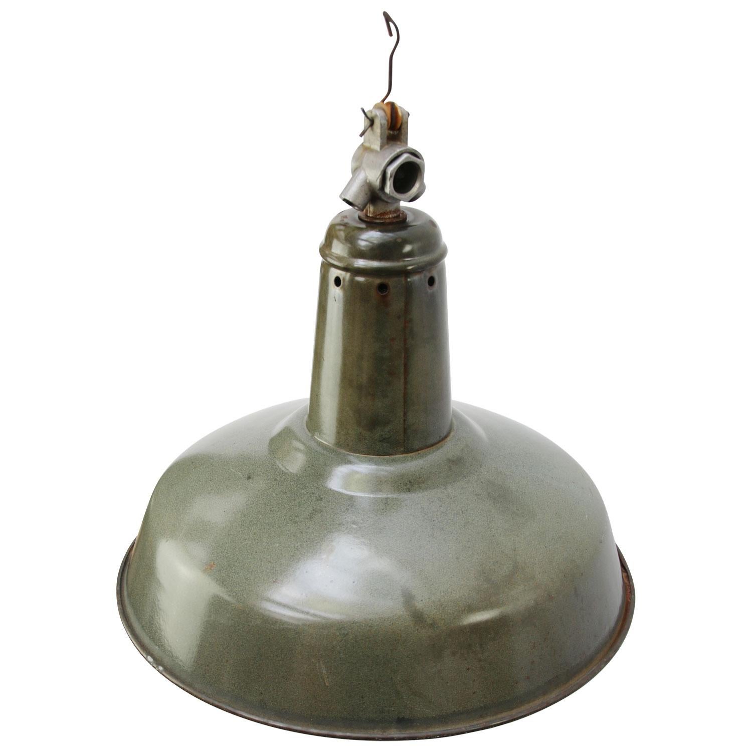 Industrial factory pendant
Green / grey enamel, white interior

Weight: 1.50 kg / 3.3 lb

Priced per individual item. All lamps have been made suitable by international standards for incandescent light bulbs, energy-efficient and LED bulbs.