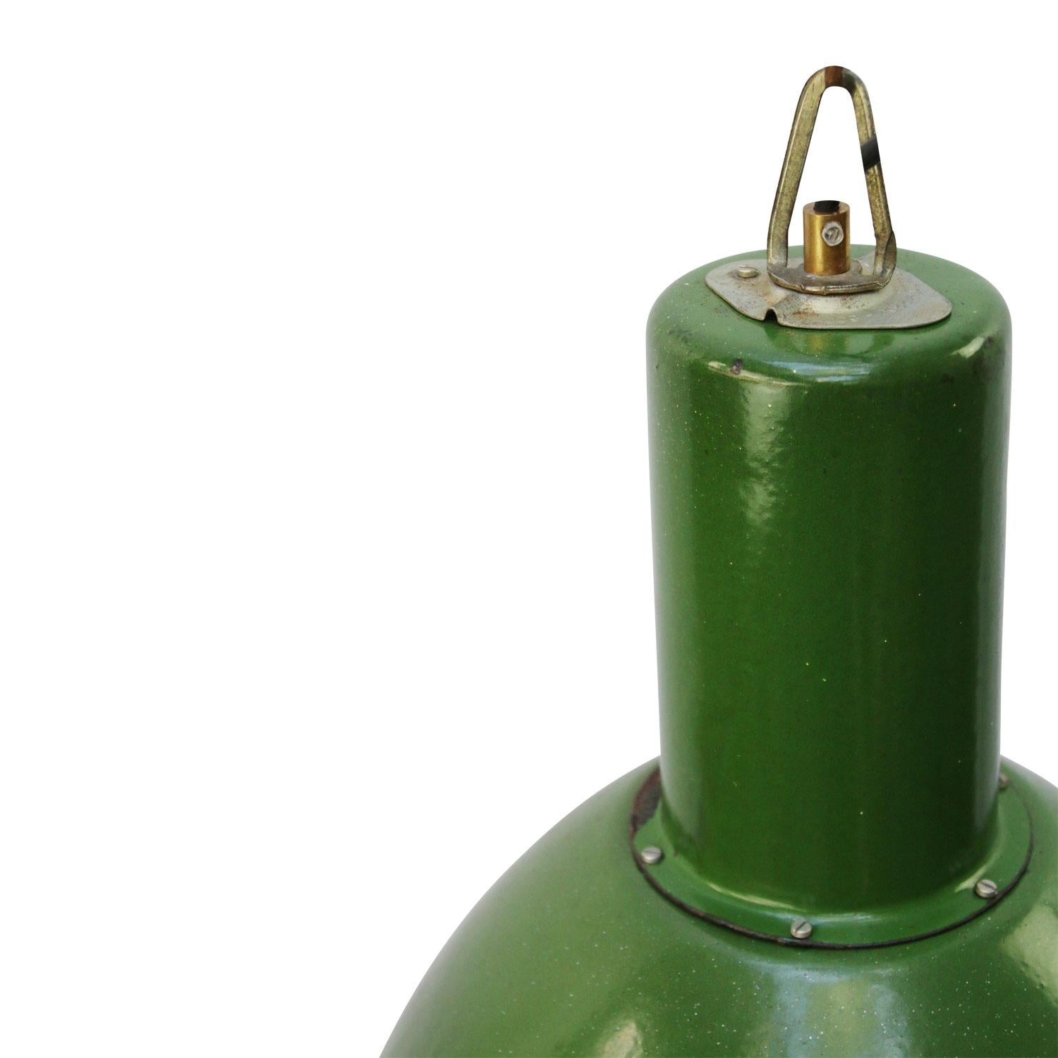 Enamel industrial pendant
green enamel shade, white inside.
Green enamel top.

Weight: 3.40 kg / 7.5 lb

Priced per individual item. All lamps have been made suitable by international standards for incandescent light bulbs, energy-efficient