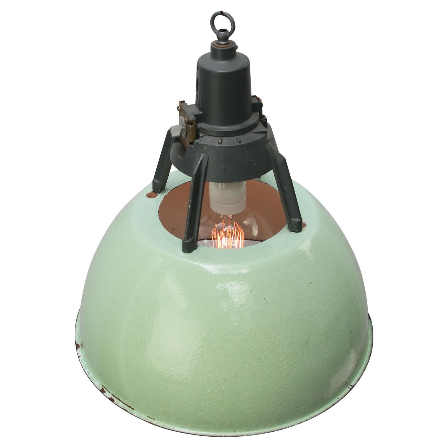 Enamel industrial pendant.
Green enamel shade, white inside.
Dark grey cast aluminum top.

Weight: 2.90 kg / 6.4 lb

Priced per individual item. All lamps have been made suitable by international standards for incandescent light bulbs,
