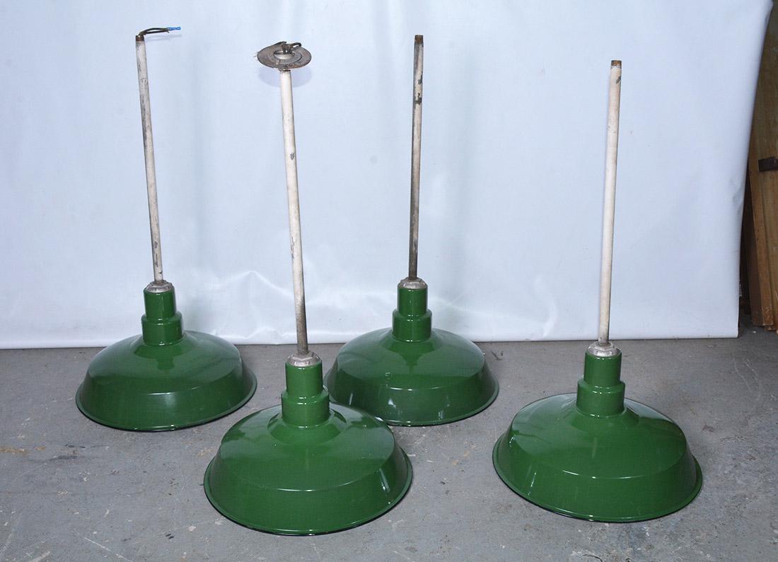 Vintage enamel Industrial hanging pendant light fixture. Originally for factory or warehouse use. Four available. Rod can be cut to order. Priced for single light. Poles can be painted for a small fee if more perfect condition is desired.