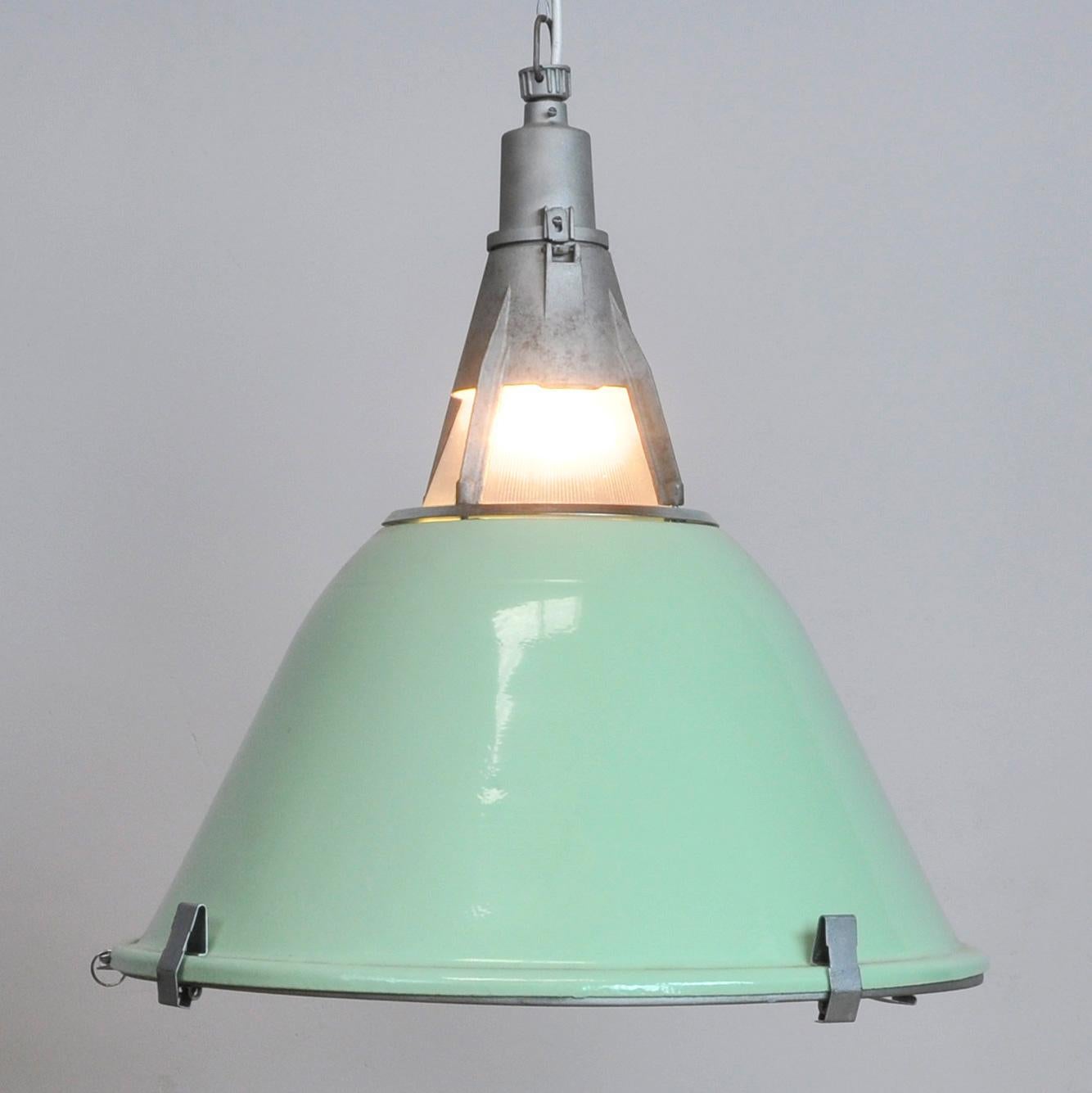 Mint green enameled pendant light from Ukraine with the original prismatic glass on the top. Glass plate on the bottem. Rewired, tested and ready to use.