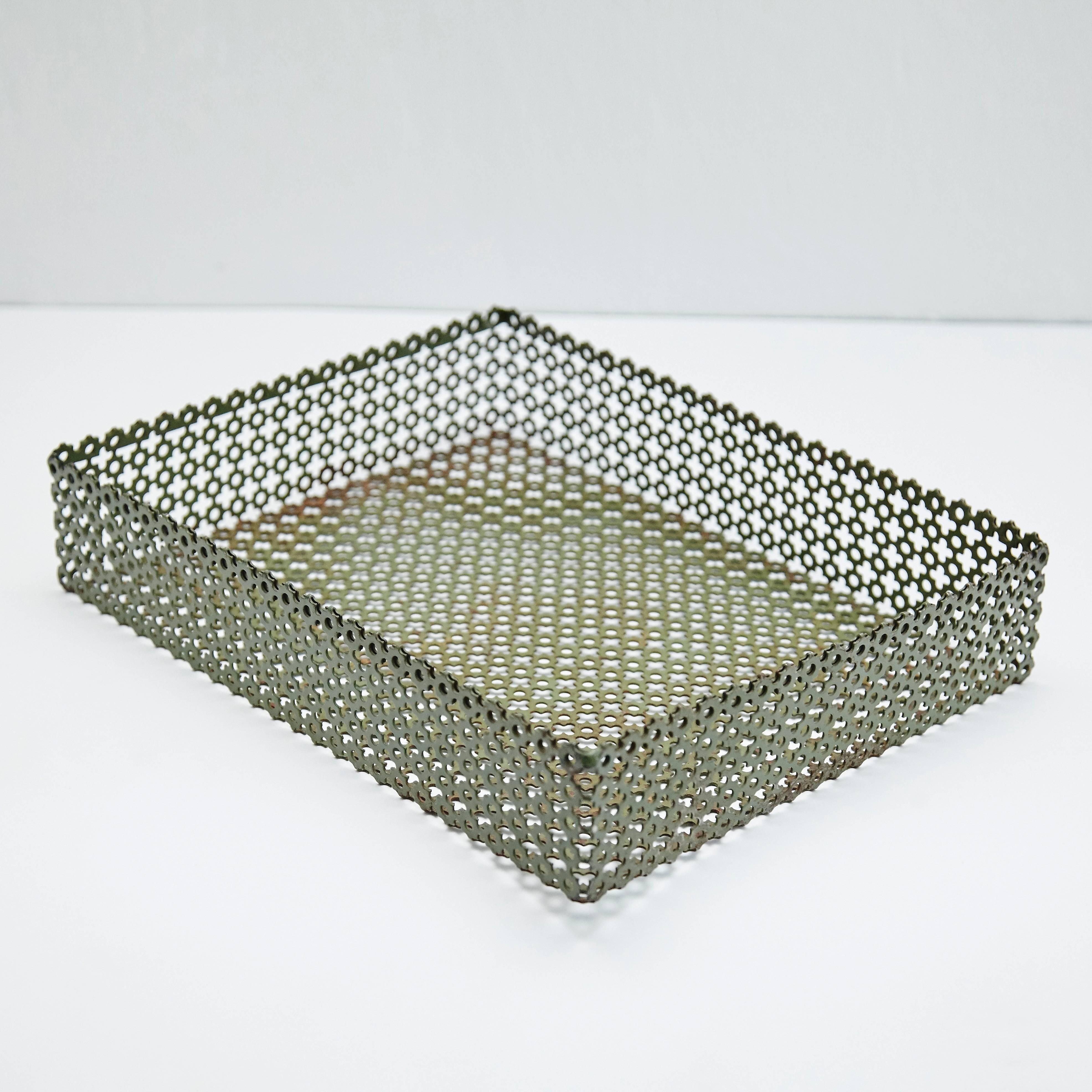 Enameled metal tray designed after Mathieu Matégot.
Manufactured in France, circa 1950.
Lacquered perforated metal with original paint.

In original condition, with minor wear consistent with age and use, preserving a beautiful patina.

 

  