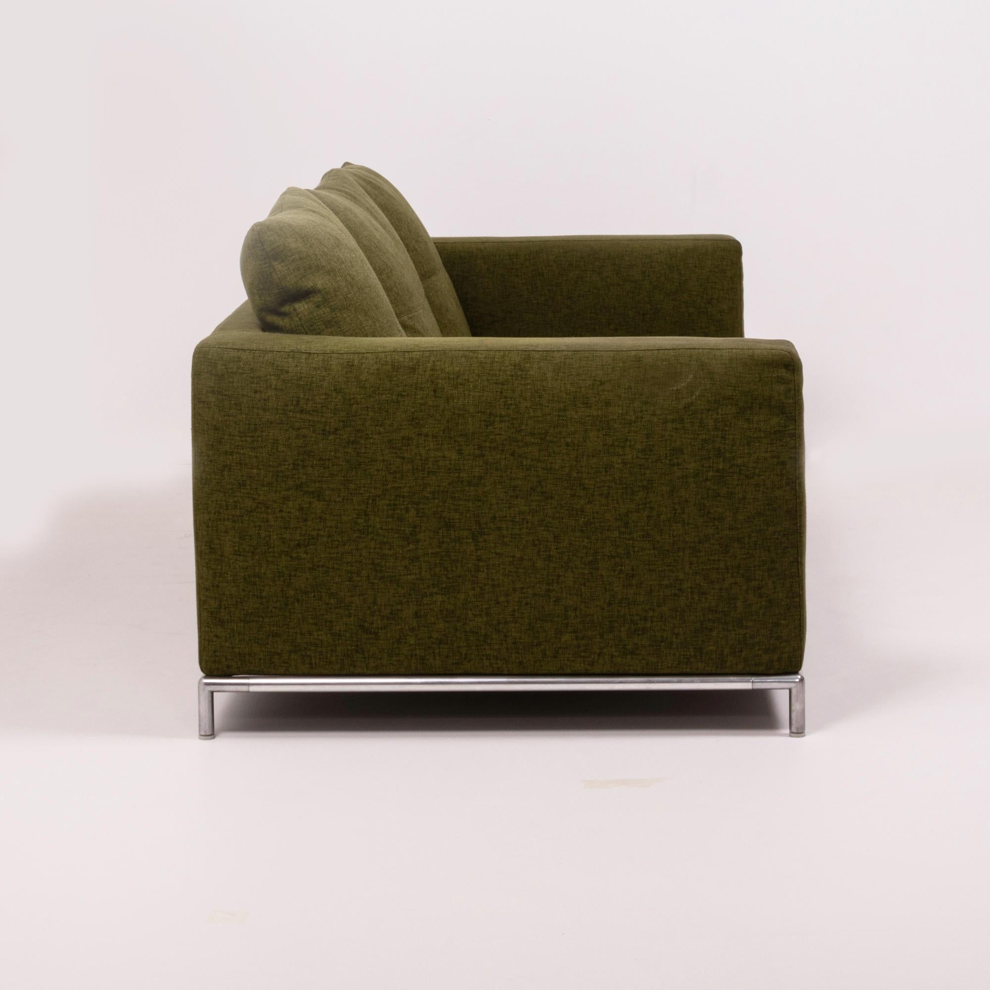 Originally designed in 2001 by Antonio Citterio for B&B Italia, this George three-seat sofa offers both comfort and style. 

The sofa features a slim tubular steel frame with protective glides and is fully upholstered in a beautiful olive green