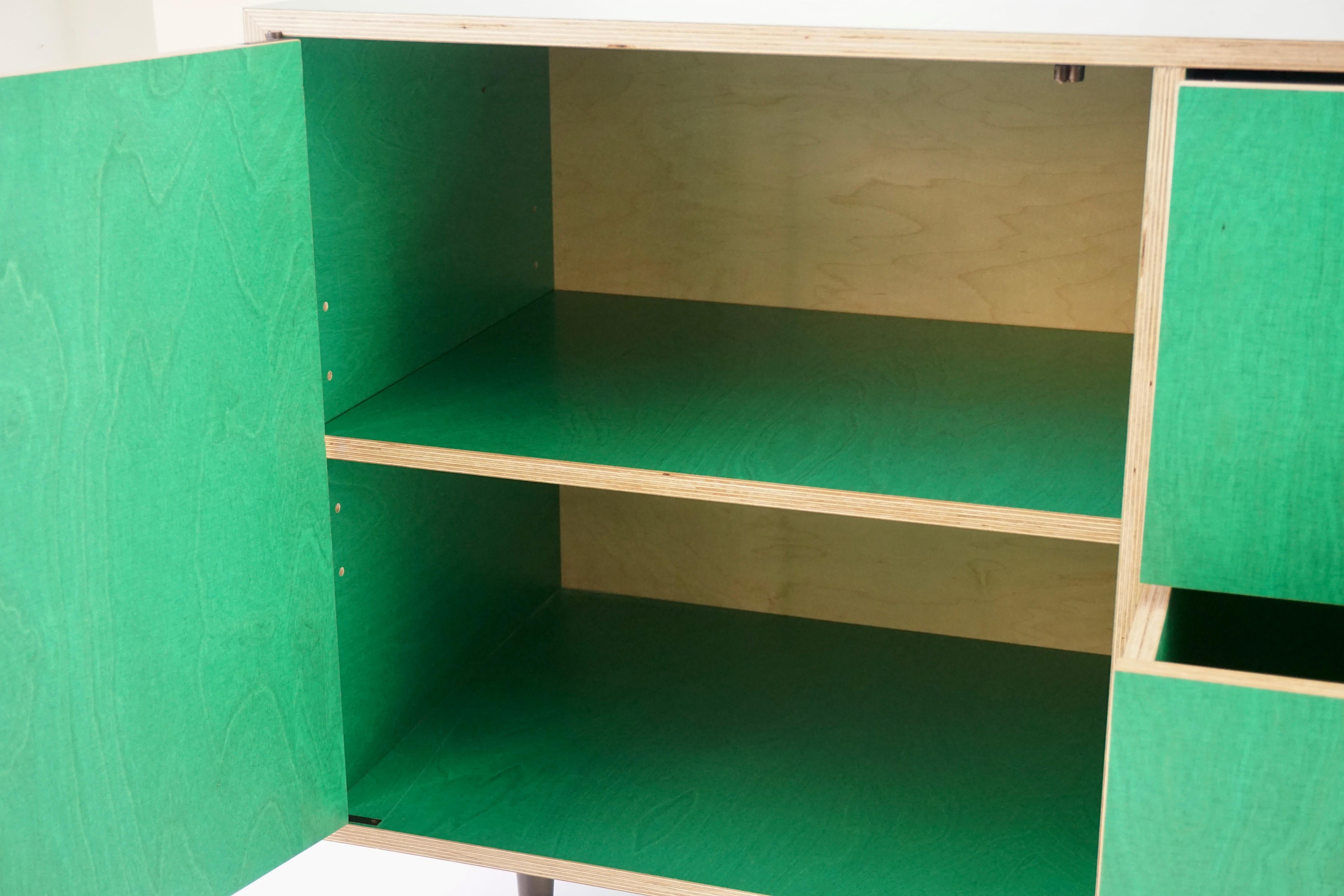 Contemporary Green Finn-Ply Cabinet with Bronze Pulls and Turned Bronze Legs