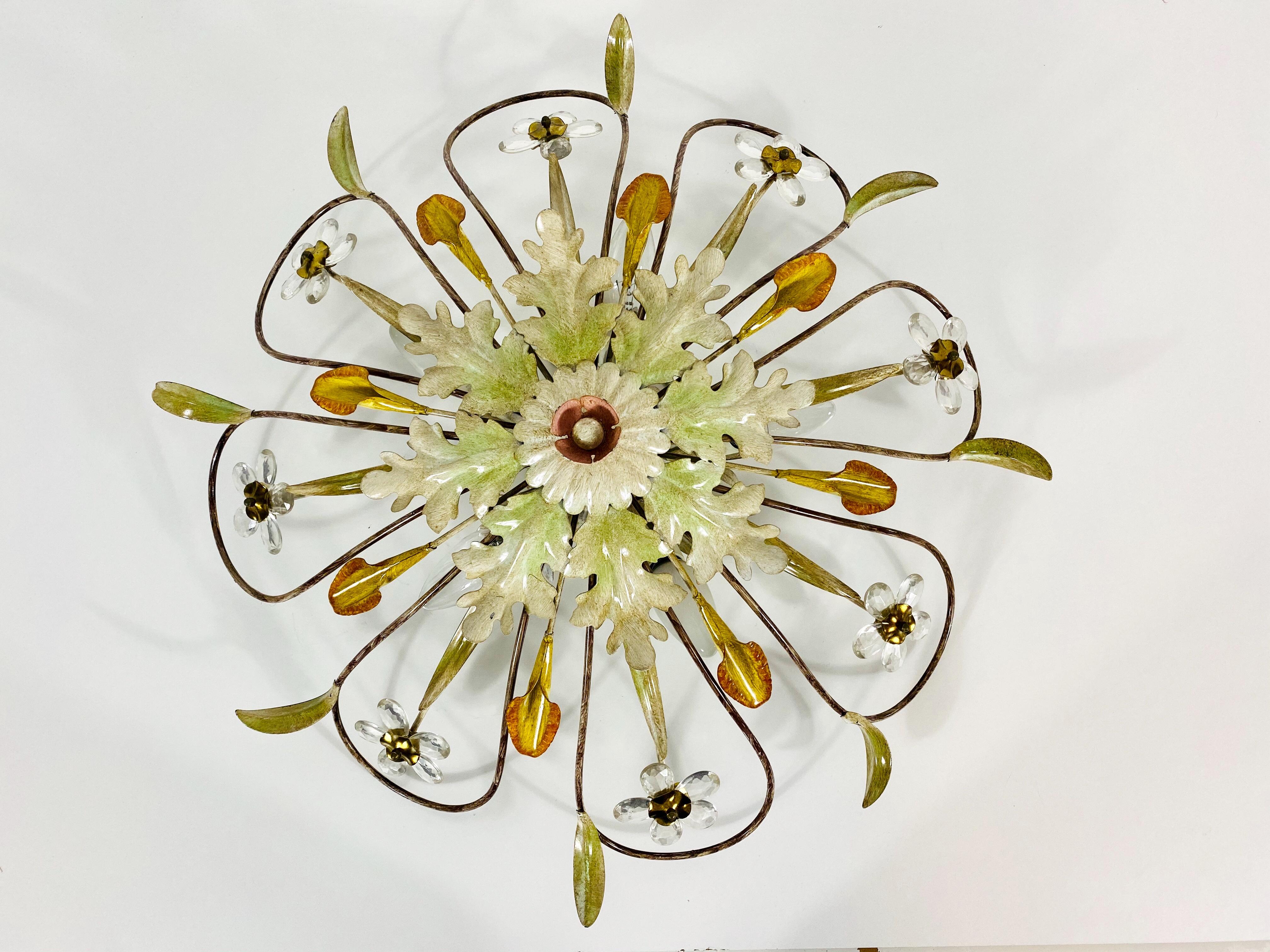 An extraordinary flushmount attributed to Banci made in Italy in the 1950s. The lamp has a beautiful wheat sheaf design. It is made in the period of Hollywood Regency. The leafs are made of Murano glass.

The light requires E14 light bulbs. Very