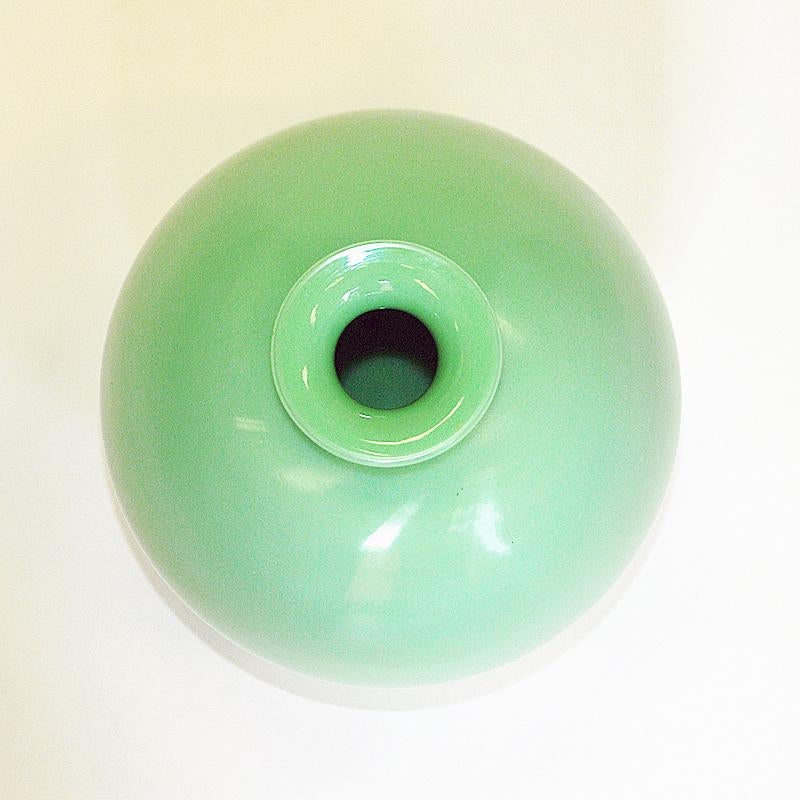 Swedish Green Flowerball glass vase by Harald Notini for Pukeberg, Sweden 1930s For Sale