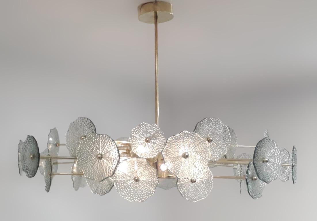 Italian chandelier with smoky green Murano glasses with bubbles mounted on polished brass frame by Fabio Ltd / Made in Italy
12 lights / G9 type / max 40W each
Diameter: 45 inches / Height: 29.5 inches including rod and canopy
Order Reference #: