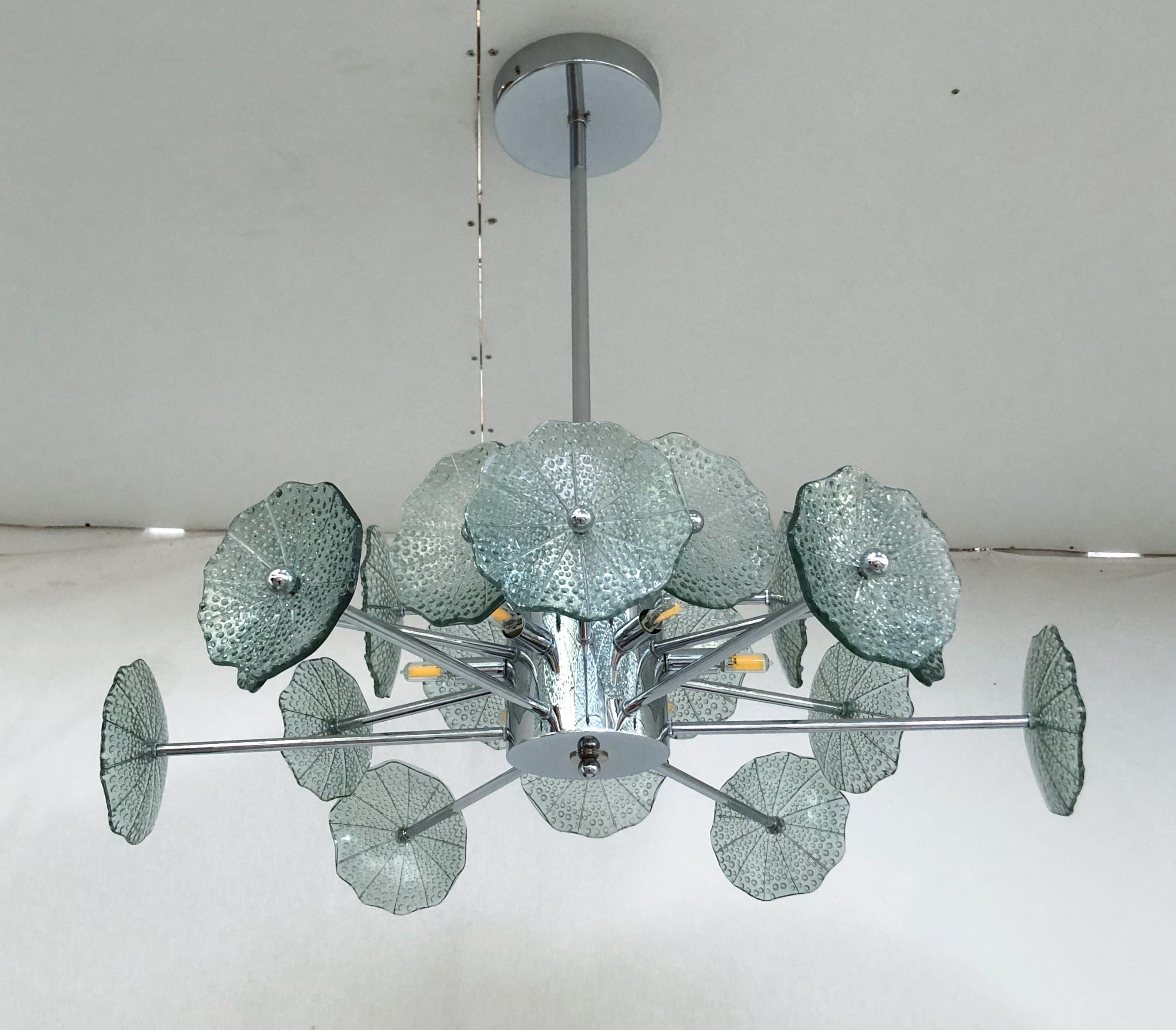 Italian chandelier with smoky green Murano glasses with bubbles mounted on polished chrome finish frame by Fabio Ltd / Made in Italy
6 lights / G9 type / max 40W each
Diameter: 29.5 inches / Height: 27.5 inches including rod and canopy.
 