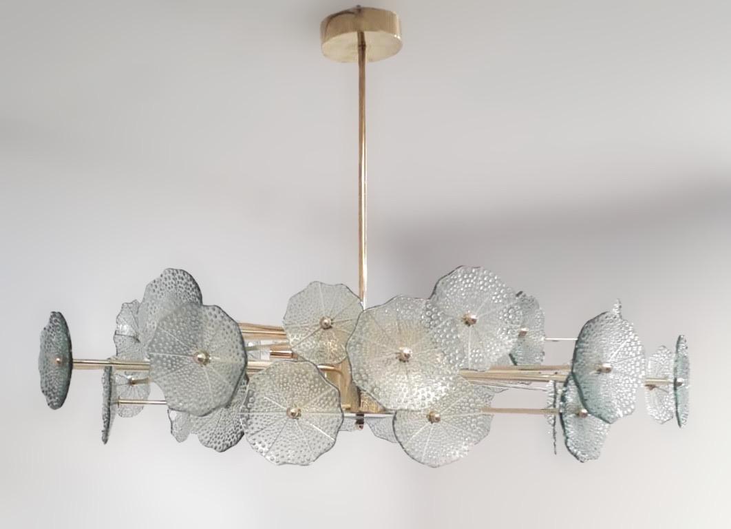 Italian chandelier with smoky green Murano glasses with bubbles mounted on polished brass frame by Fabio Ltd / Made in Italy
12 lights / G9 type / max 40W each
Diameter: 45 inches / Height: 29.5 inches including rod and canopy
Order Reference #: