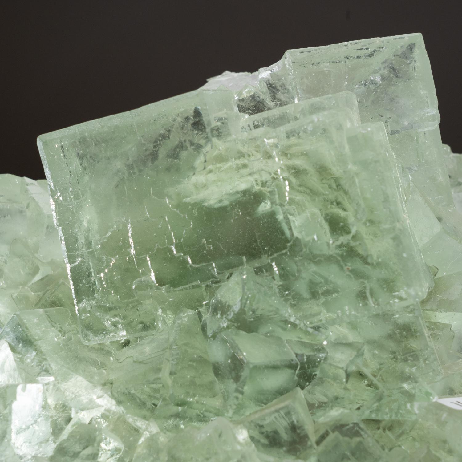 From Yaogangxian Mine, Nanling Mountains, Hunan Province, China  

Translucent green fluorite crystal cluster with bright luster and well crystallized. The fluorite crystals are transparent and cubic crystal habit with complex corners of smaller