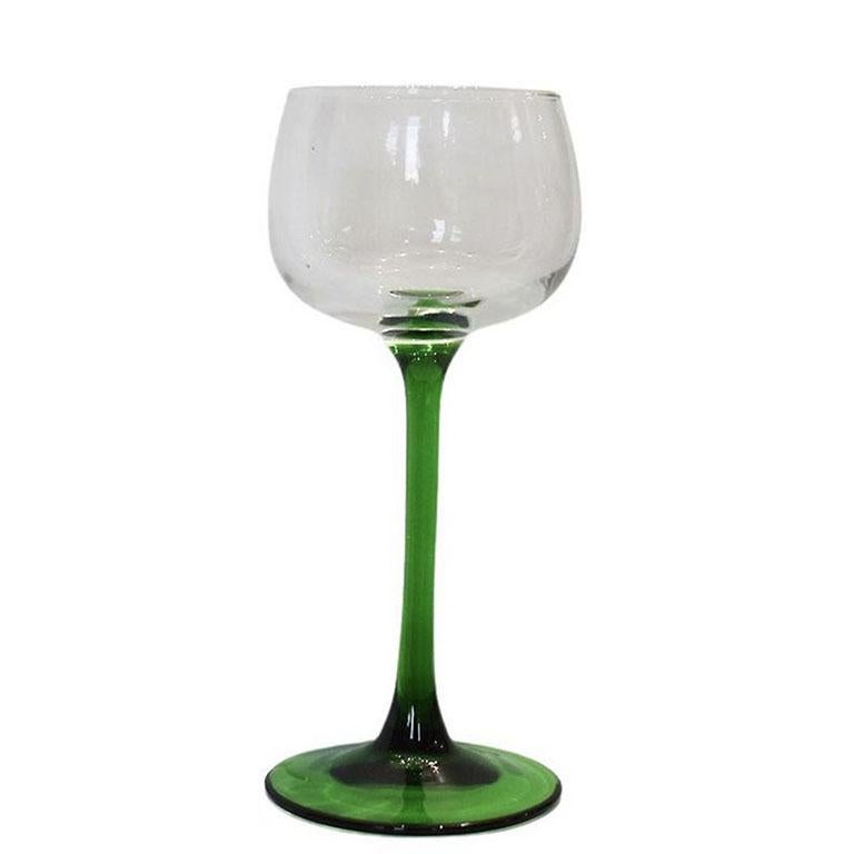 A set of eight French cordial glasses with transparent bodies and green glass stems. Created in France in the 1970s by Luminarc. 

Dimensions:
6.5