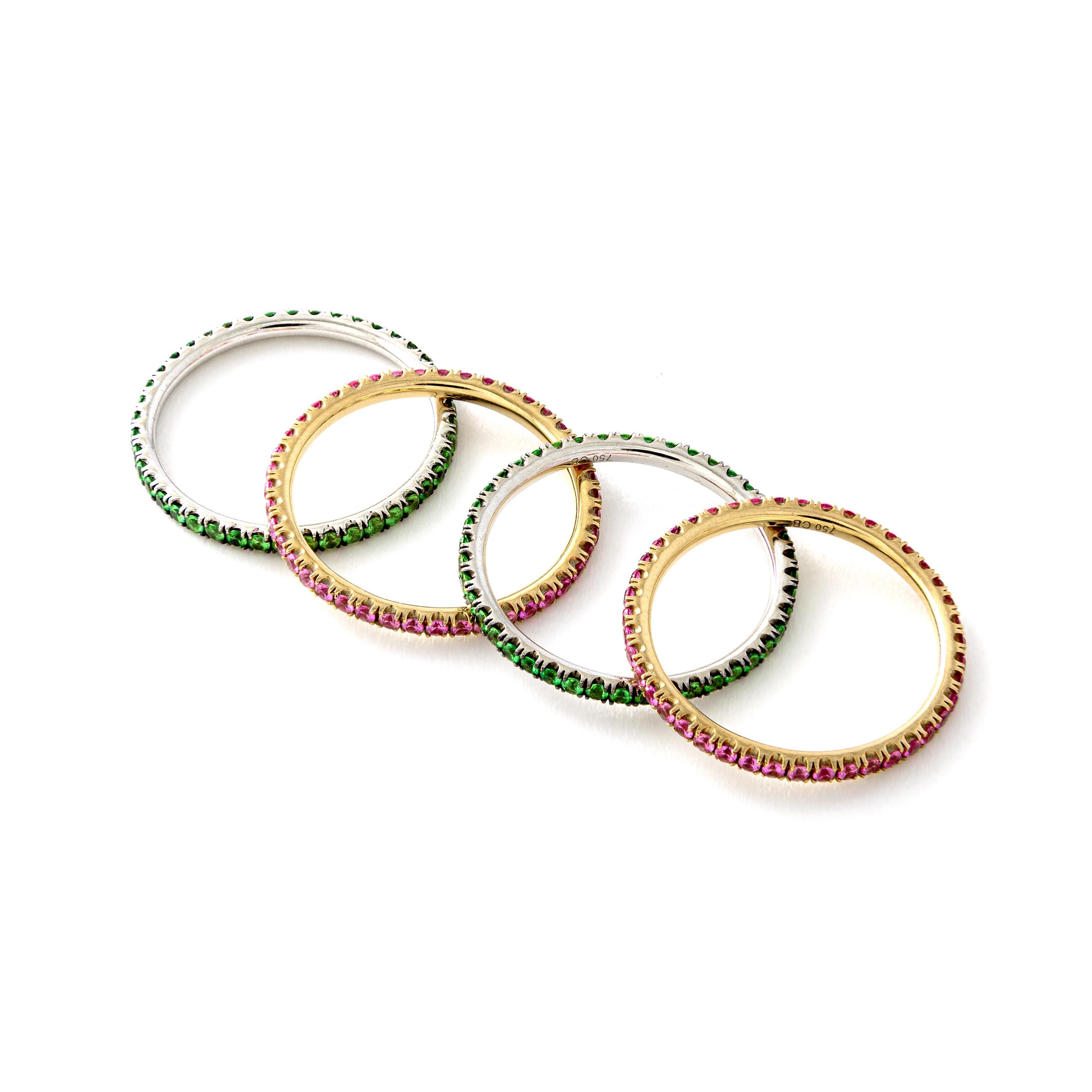 Four Green Garnet and Pink Sapphire respectively on white and rose Gold Band Rings.
Contemporary.
Size: 7 US.

