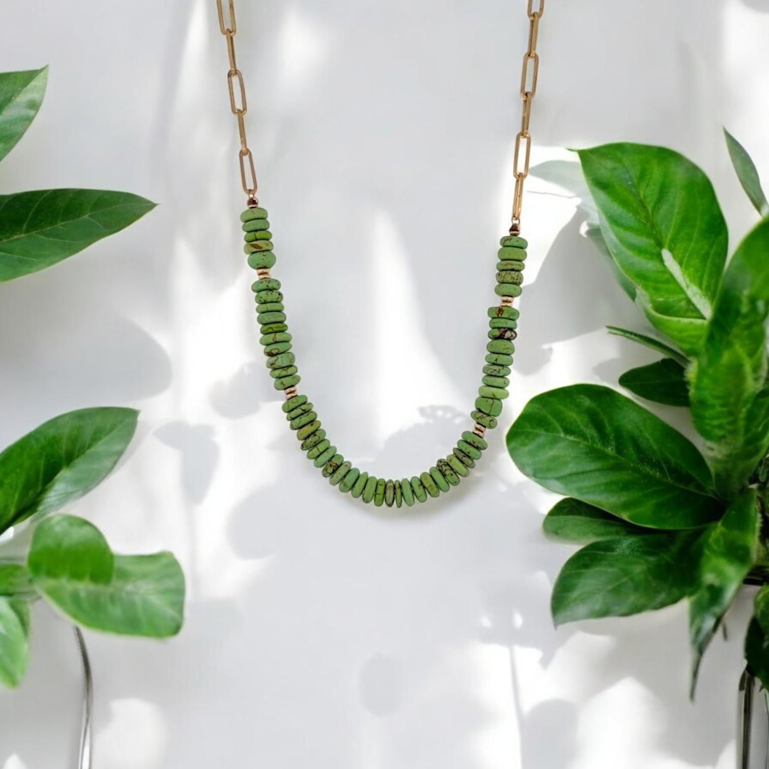 Vivid. Vibrant. Unexpected. ✨ Say hello to Elara—a bold and modern take on everyday luxury. This standout necklace features a sleek 14k yellow gold paperclip chain adorned with striking Gaspeite gemstone beads, known for their rare and electric
