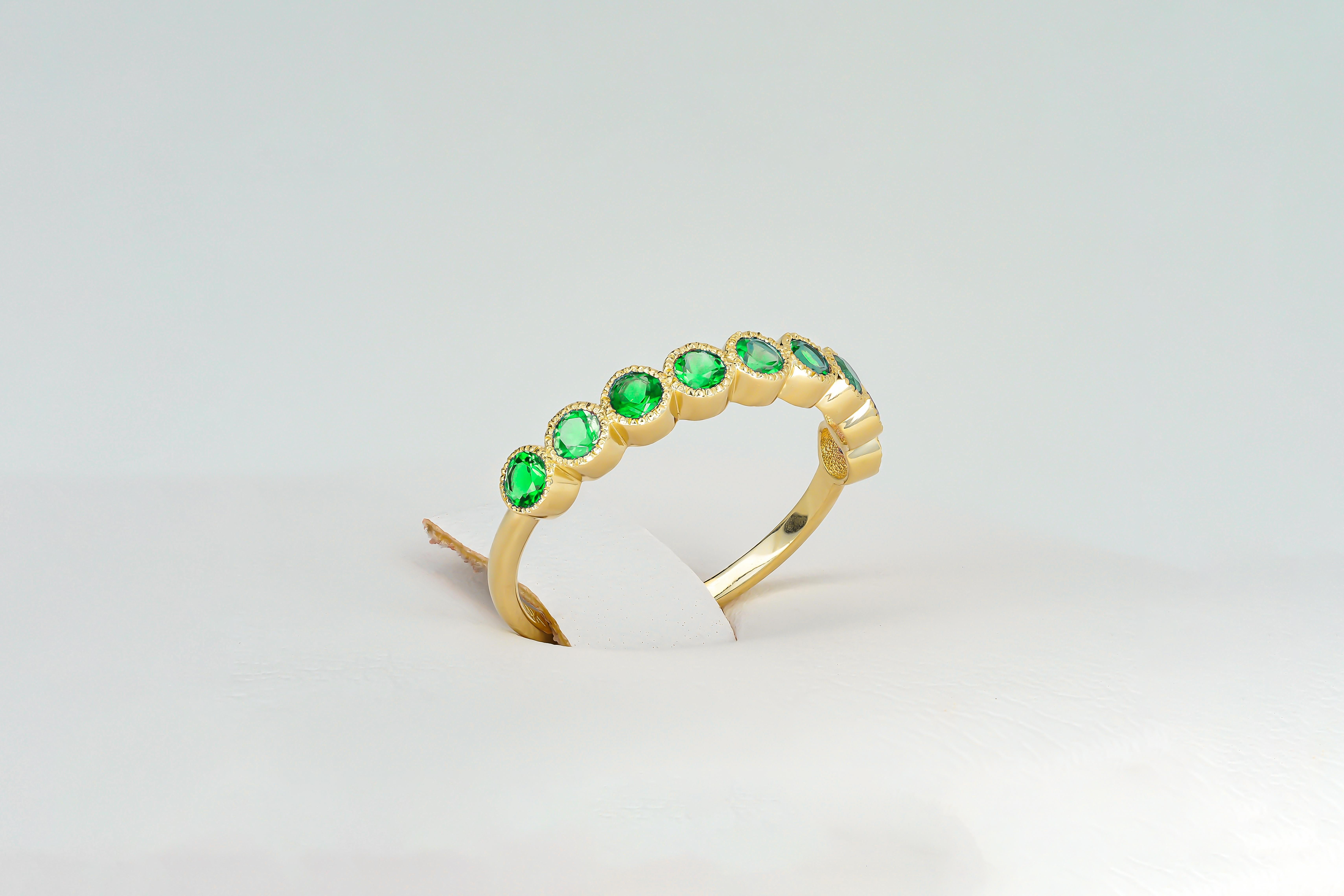 Green gem half eternity 14k gold ring.
Lab emerald semi eternity ring. Round green gemstone gold ring. 2.5 mm lab green emerald ring.

Metal: 14k gold
Weight: 1.8 gr depends from size

Gemstones:
Lab emerald, green color, round cut, 2.5 mm size.