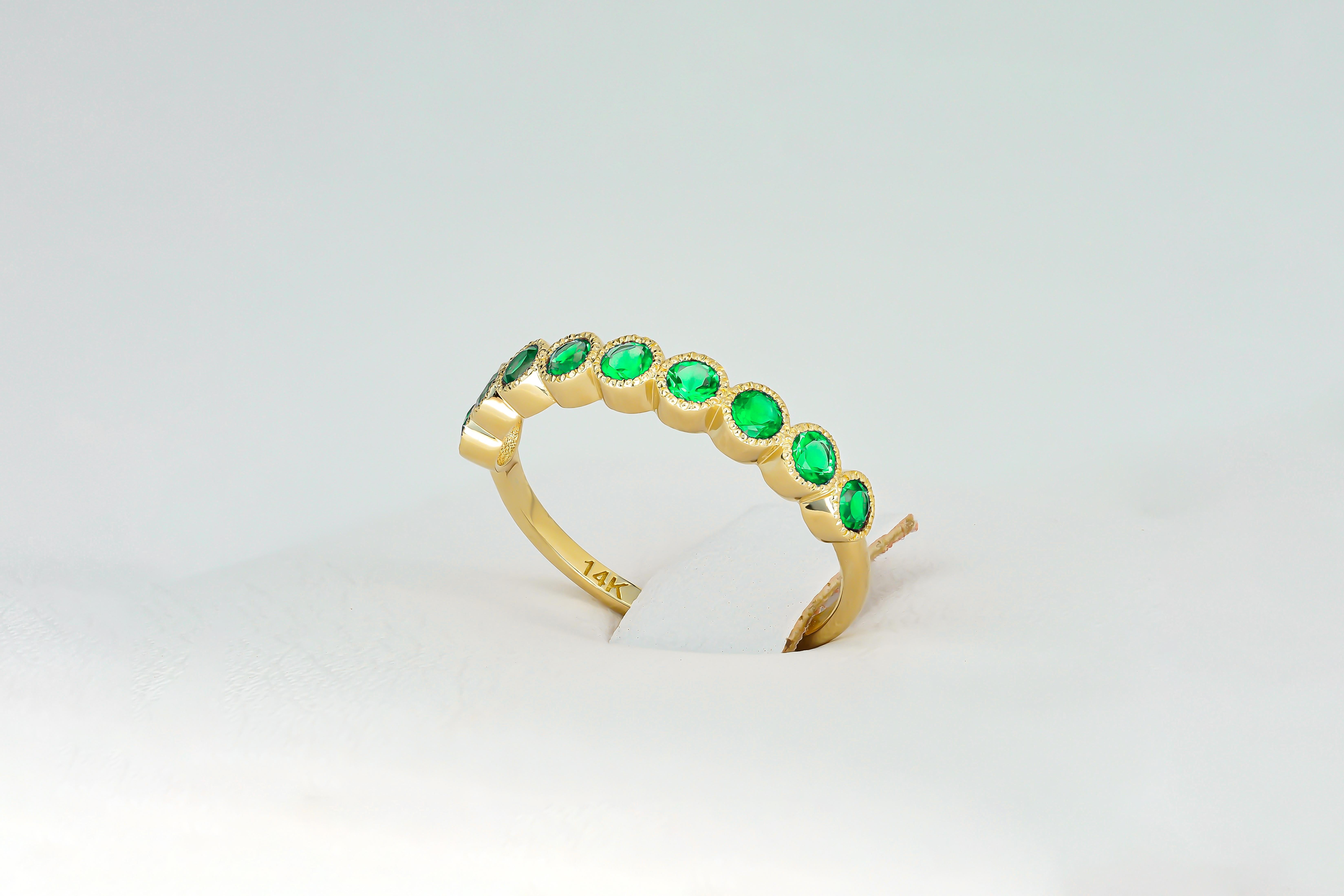 Modern Green gem half eternity 14k gold ring. For Sale