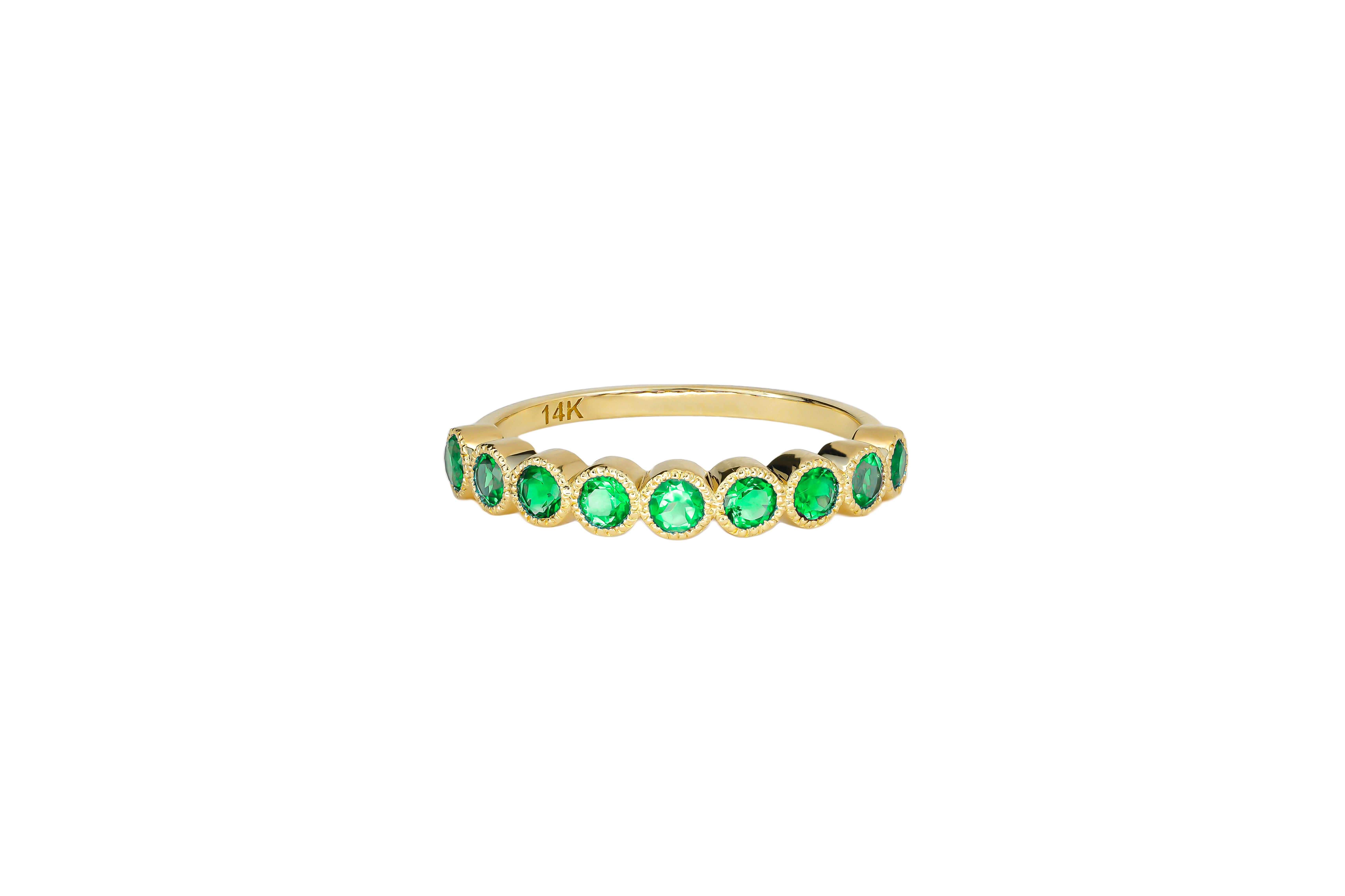 For Sale:  Green gem half eternity 14k gold ring. 7