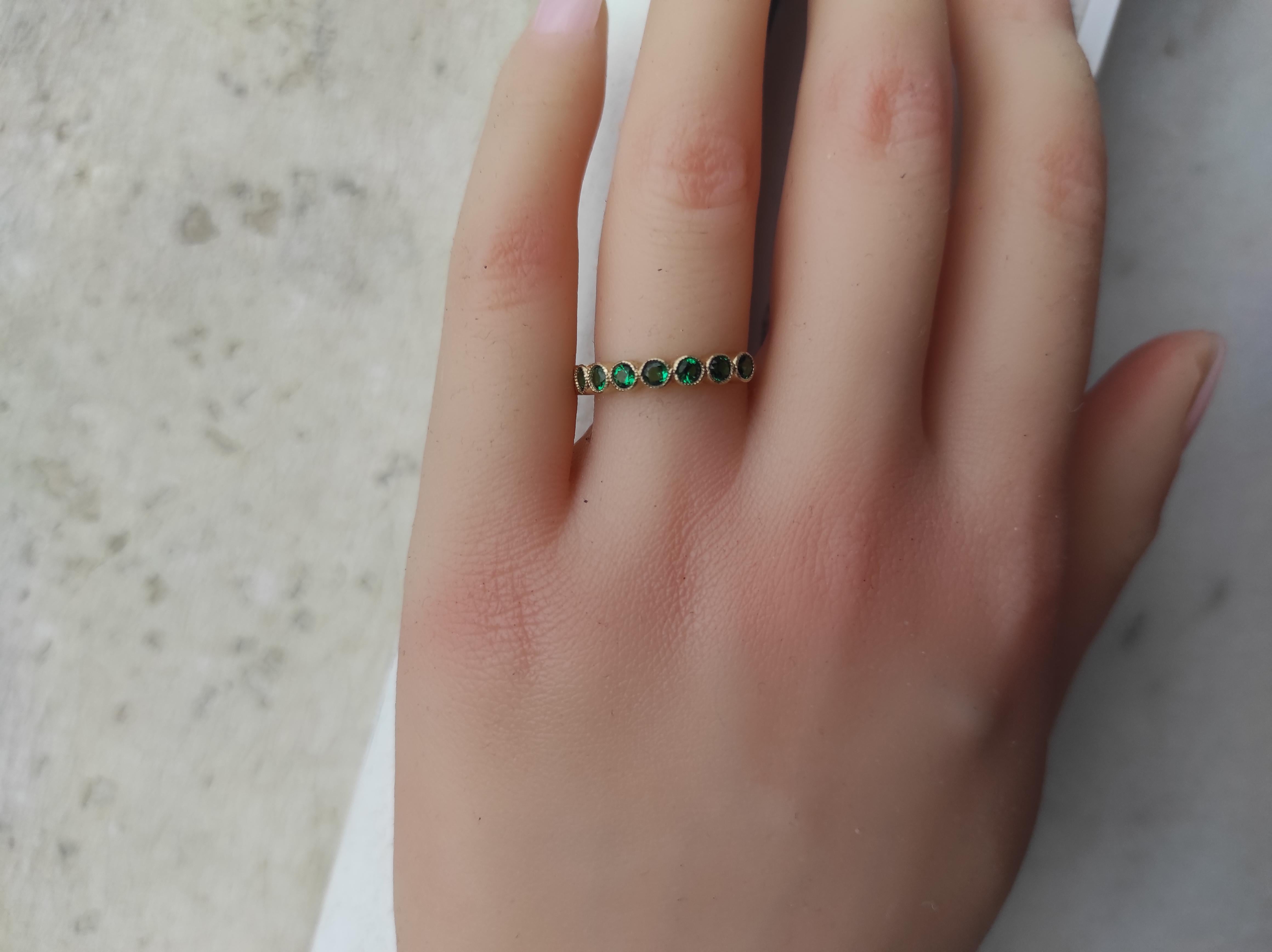 For Sale:  Green gem half eternity 14k gold ring. 9