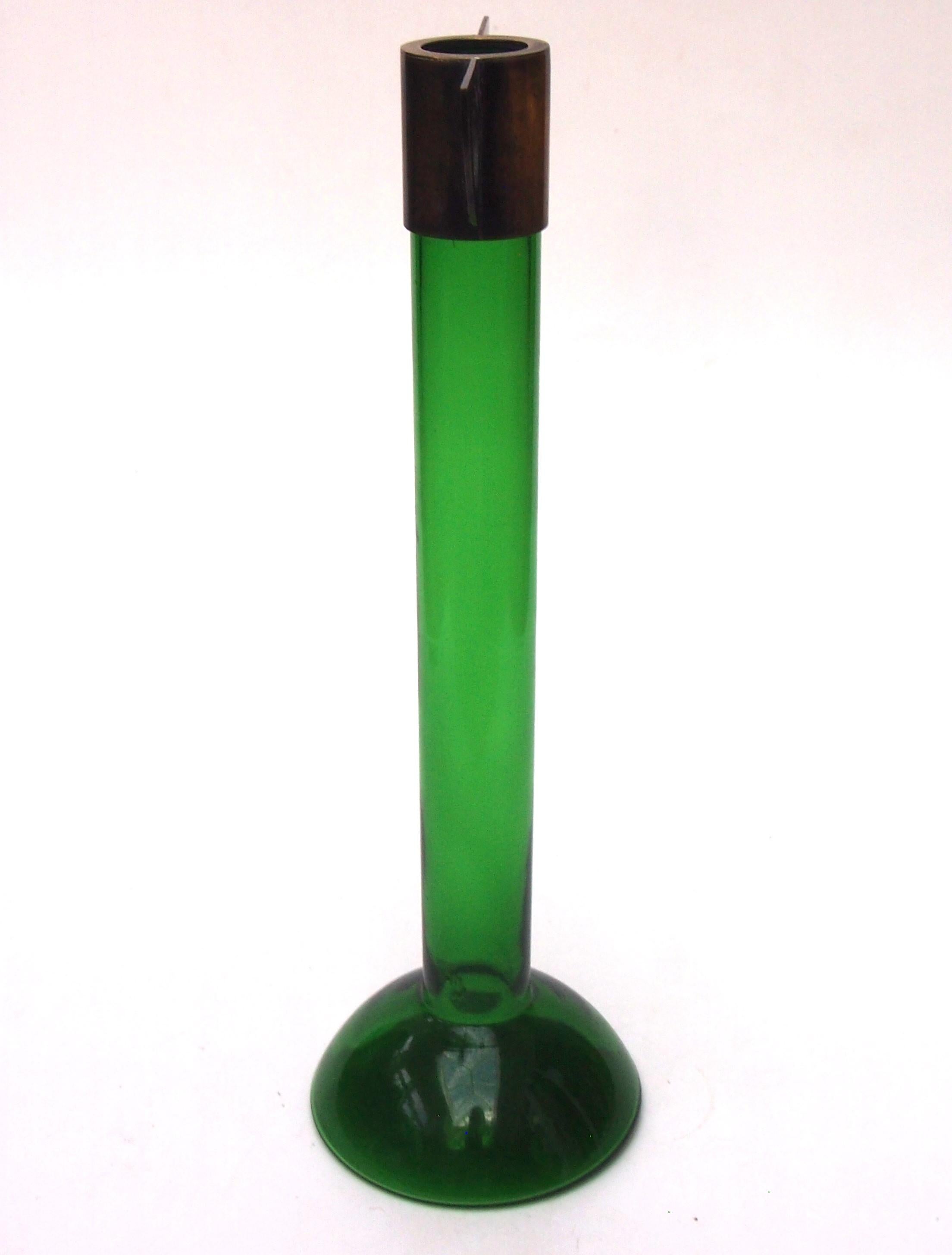 Striking tall thin green glass vase by Meyr's Neffe of Bohemian with a stylised metal top, winged by two quarter circle metal flanges decorated with large circular holes - balancing a wide domed circular glass base. A simple but very effective and