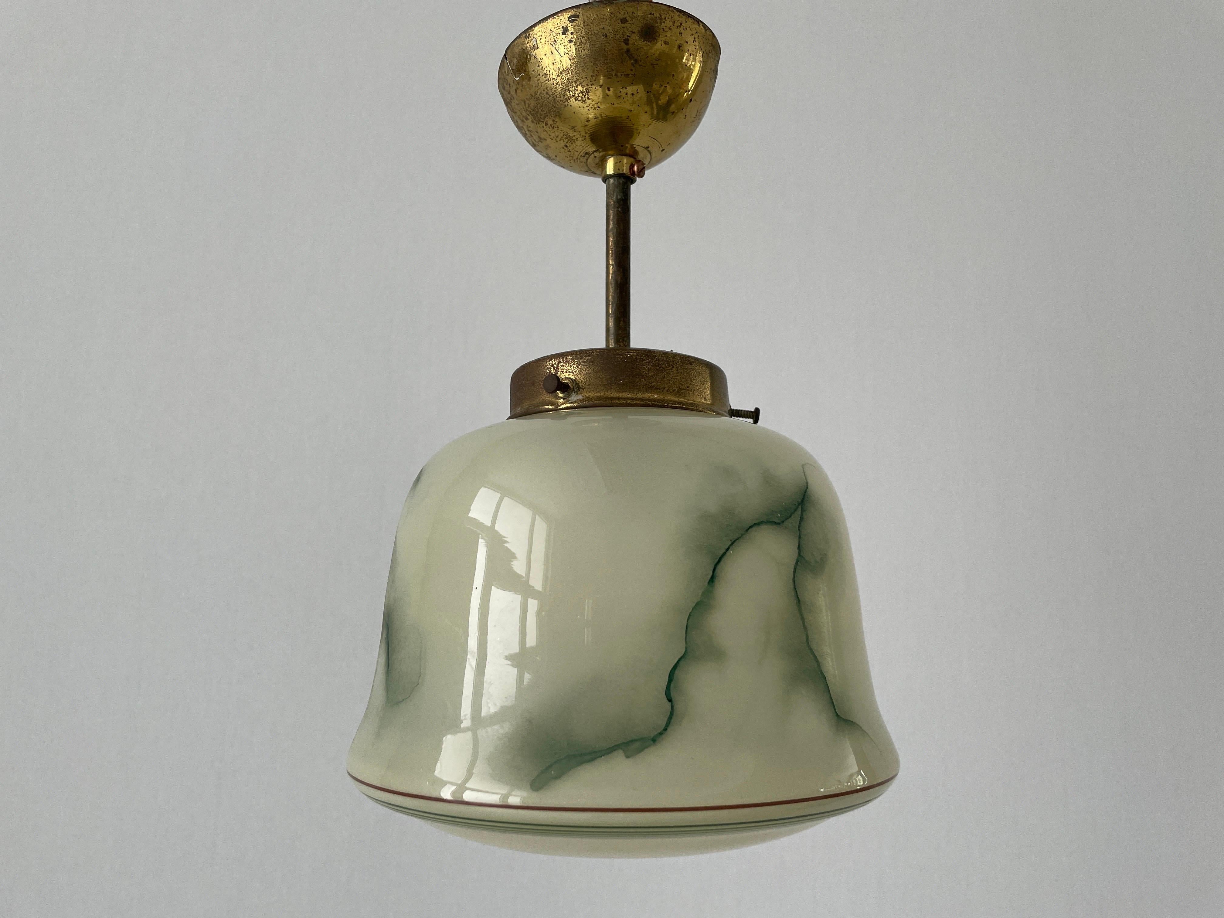 Green Glass Art Deco Small Ceiling Lamp, 1950s, Germany

This lamp works with E27 light bulb.

Measurements: 
Height: 30 cm
Shade diameter and height: 19 cm and 17 cm

