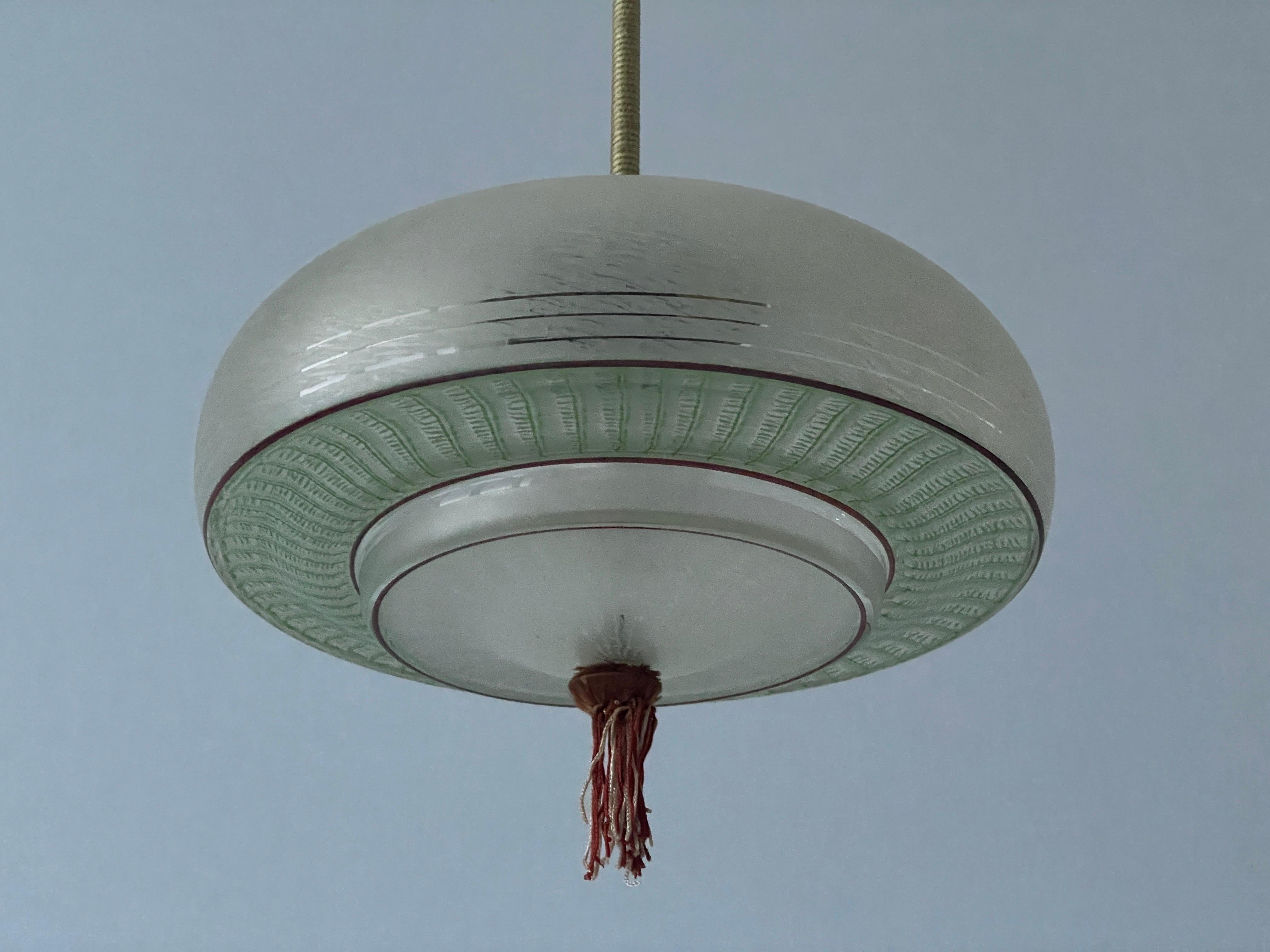 Green Glass Art Deco Style Ceiling Lamp, 1960s, Germany

This lamp works with E27 light bulb.

Measurements: 
Height: 50 cm
Shade diameter and height: 30 cm and 16 cm
