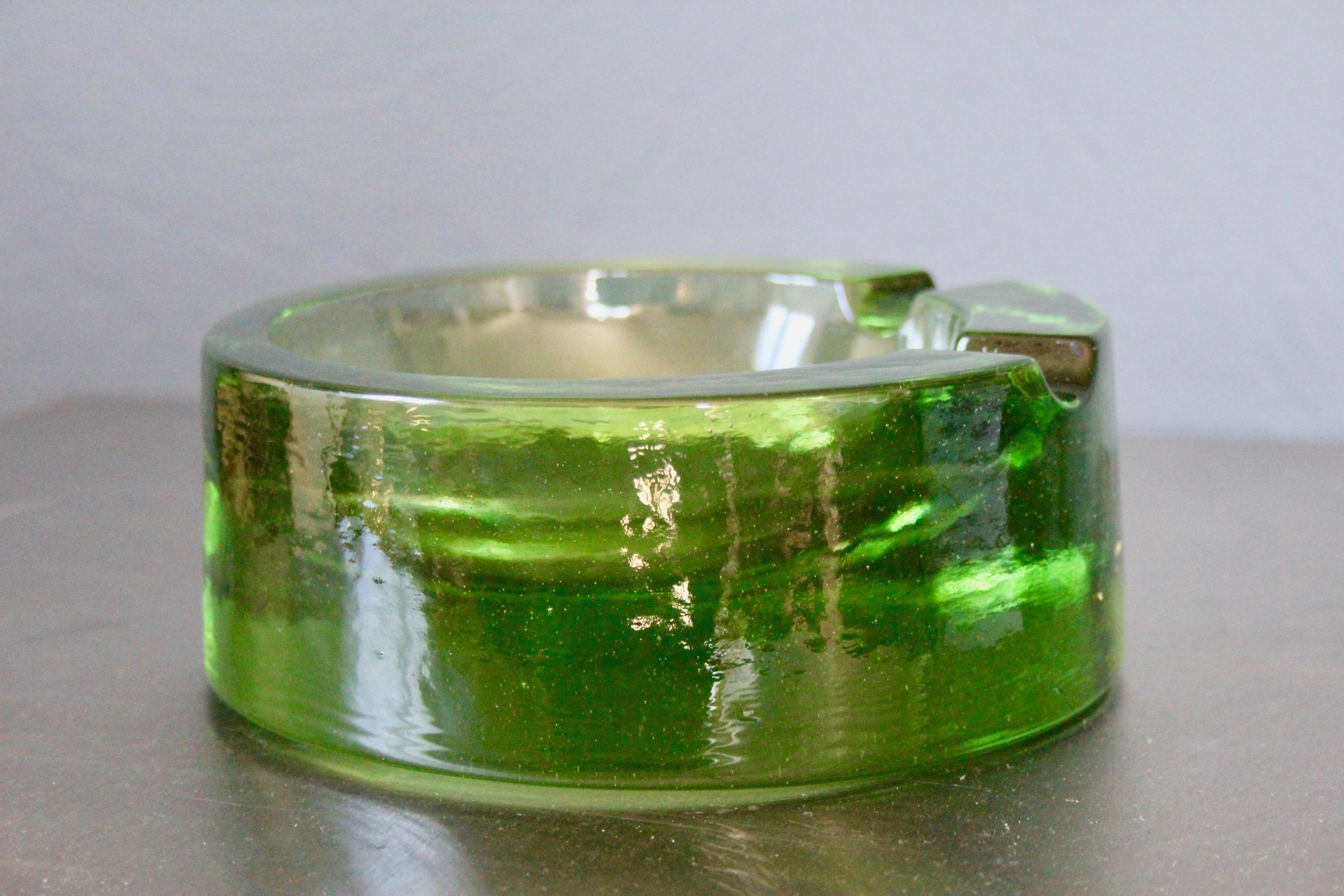 Green glass 70s ashtray.