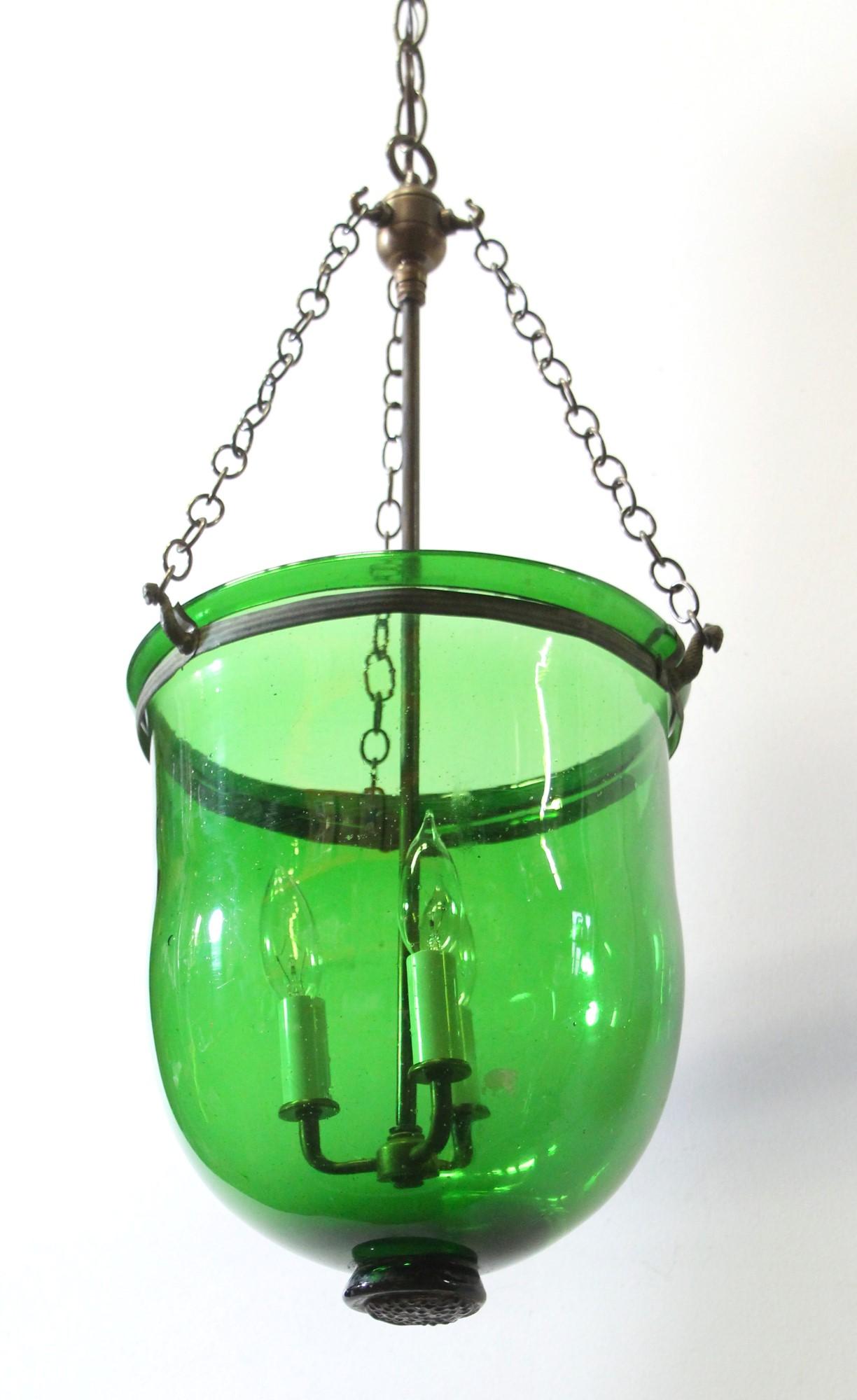 Original European antique hand blown glass bell jar pendant light with a deep green color and new brass hardware. and wiring This can be seen at our 400 Gilligan St location in Scranton, PA.