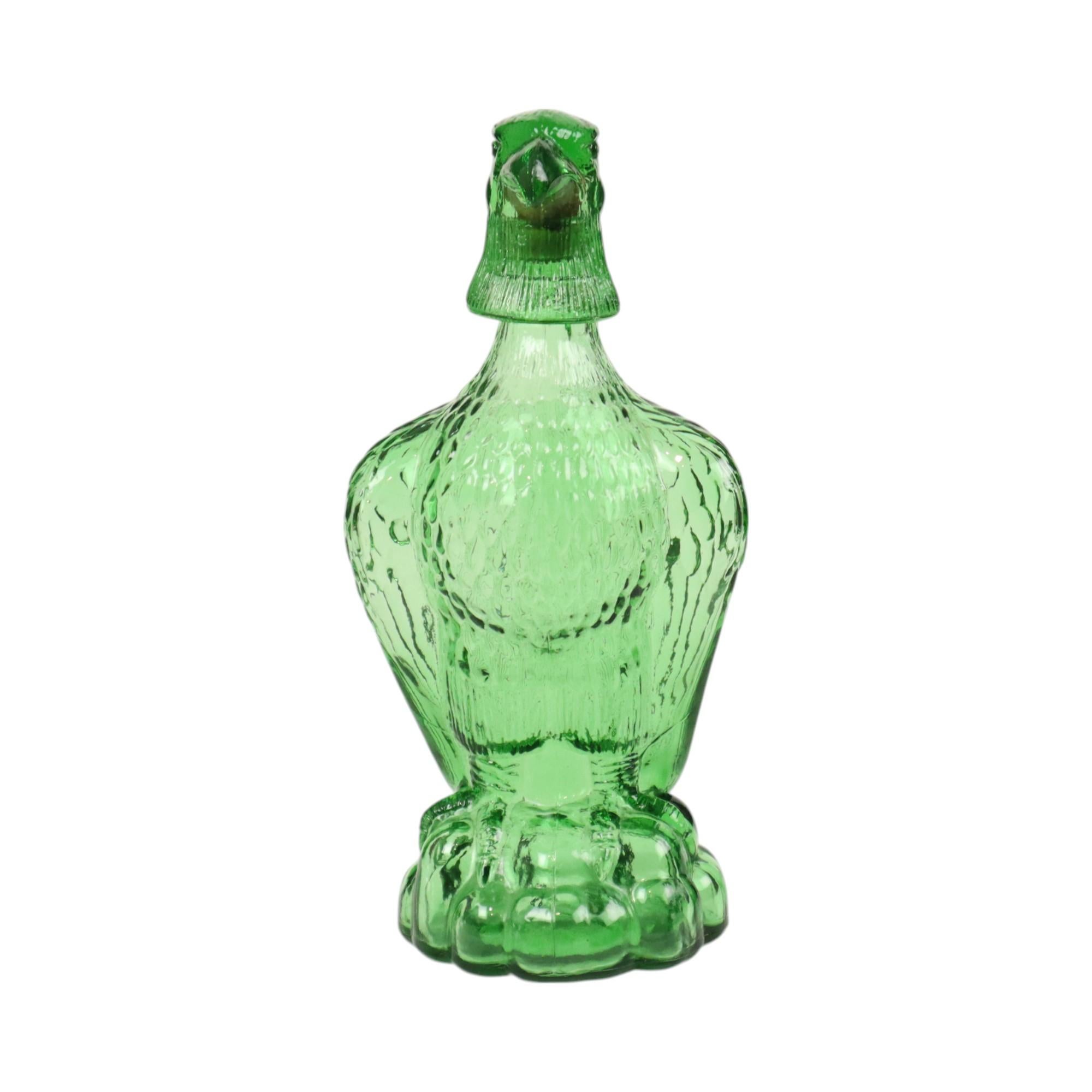 Preciosa jarra vintage de cristal verde con forma de águila o ave rapaz, de Bessi, italiana, pieza de coleccionista de los años 60-70, marcada en la parte inferior.

Estas garrafas de cristal se crearon porque la gente quería mostrar el arte del