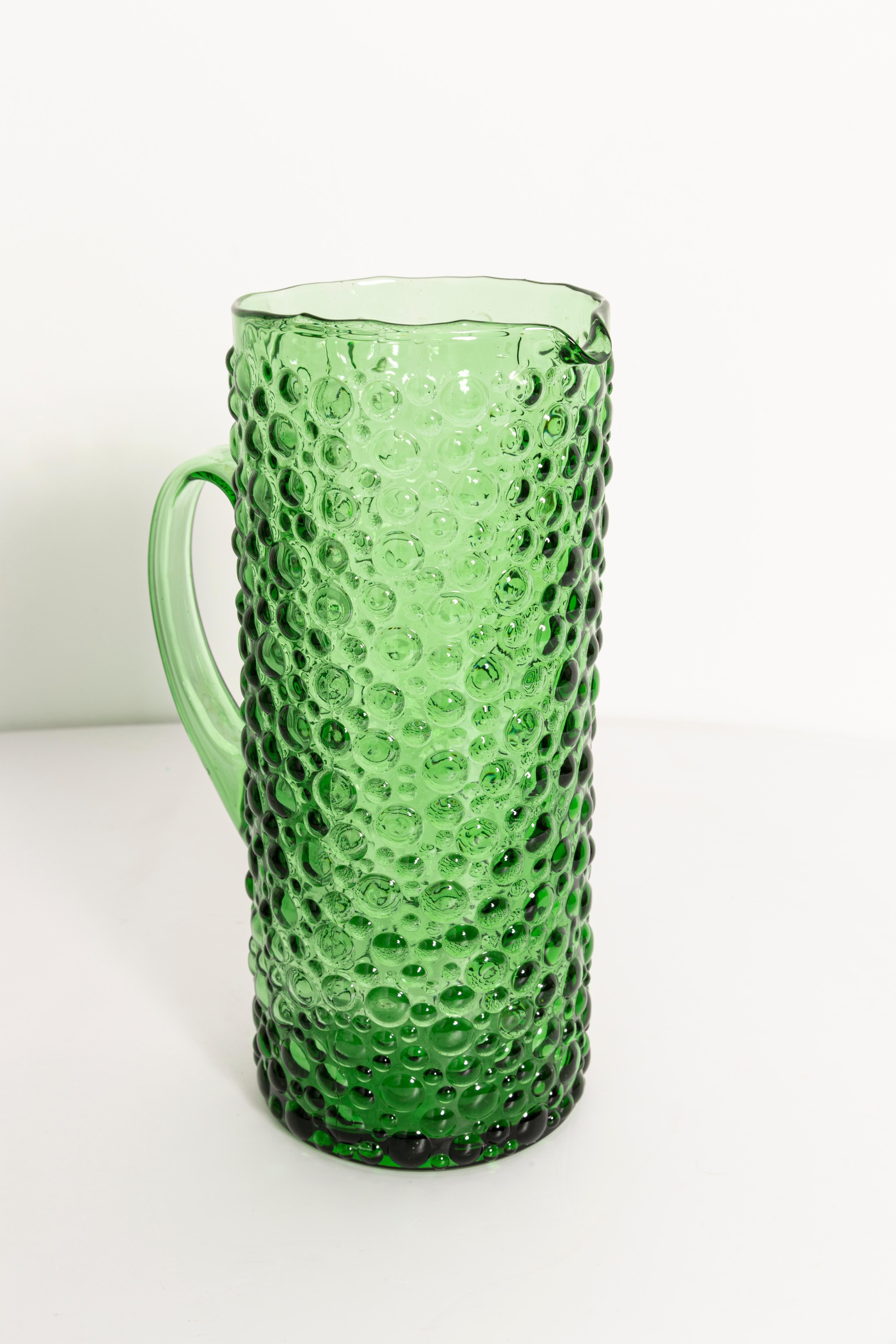 A stunning dark green glass vase with geometric bubble design, made by one of the many glass manufacturers based in the region of Empoli, Italy. Would make a great addition to any collection! Excellent condition, no chips or cracks other than a