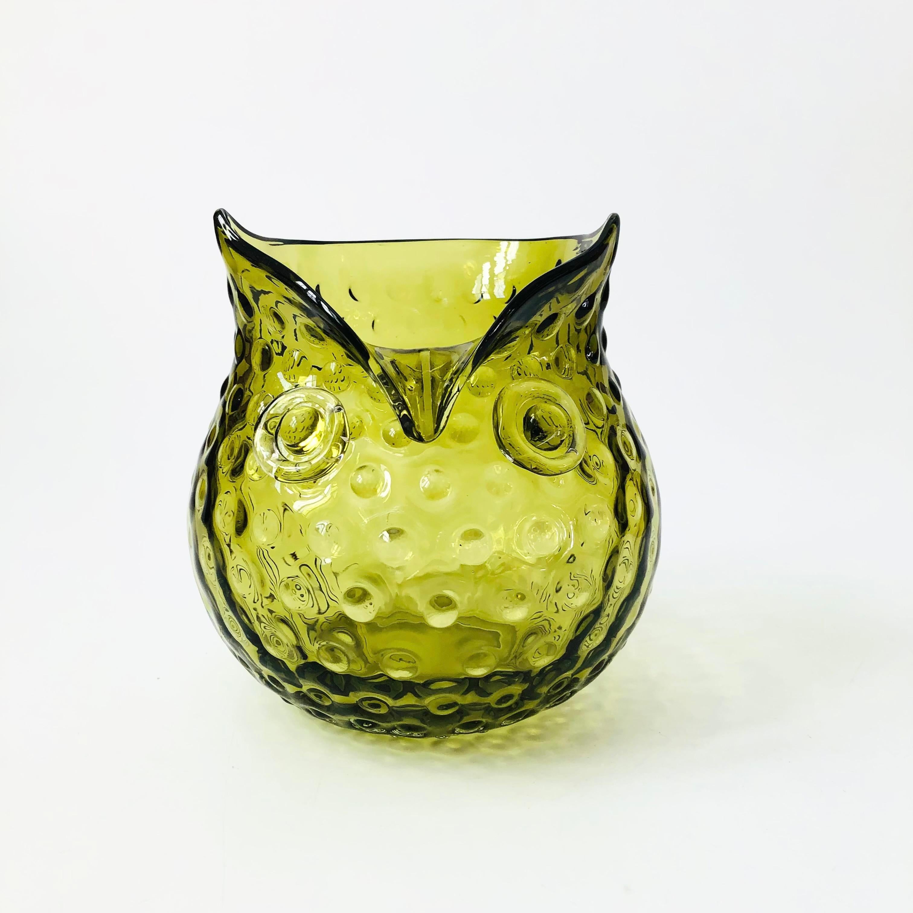 A wonderful mid century glass vase in the shape of an owl. Beautiful hobnail texture and green color to the glass.

