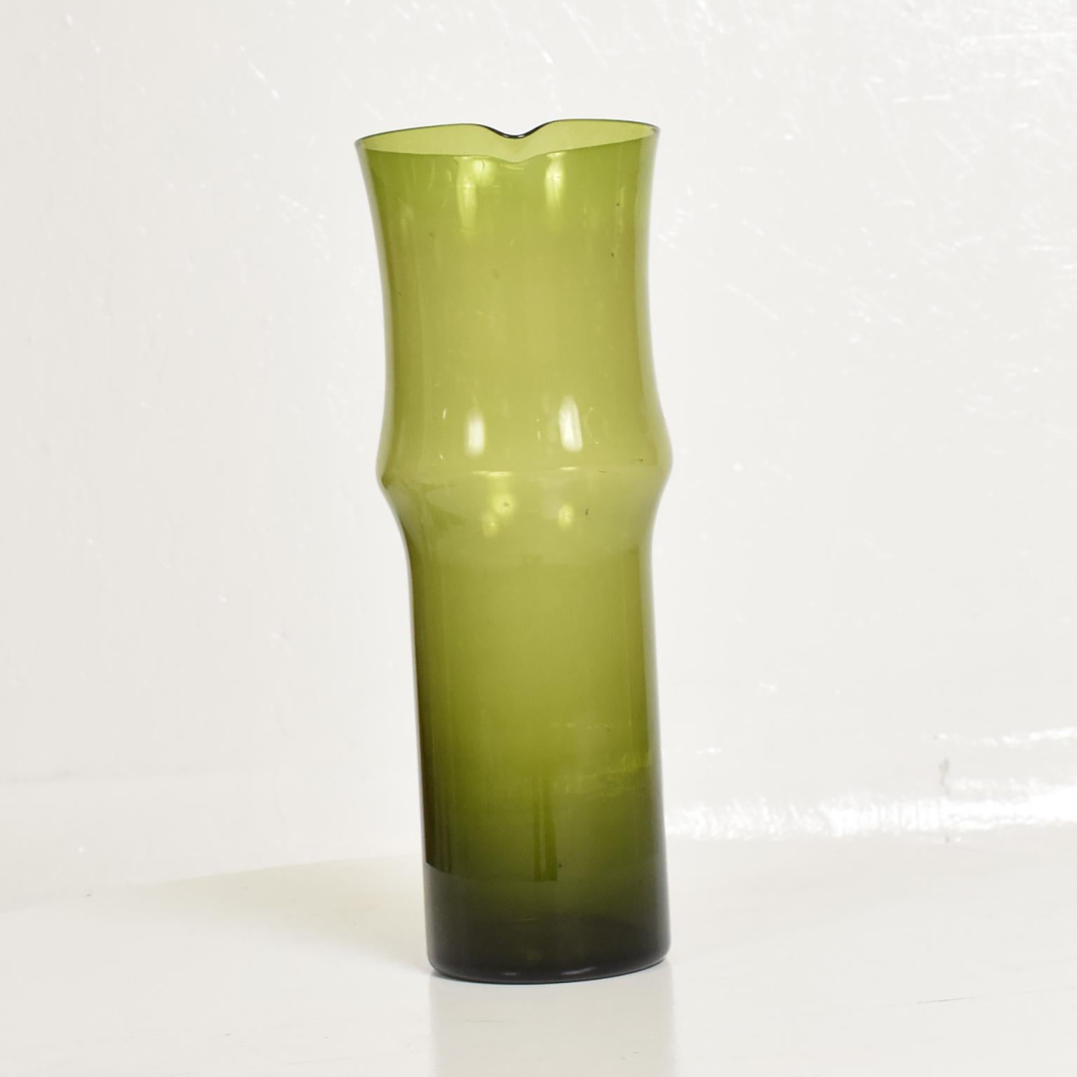 For your consideration, a vintage green glass pitcher vase by Tapio Wirkkala for Iittala.
In excellent condition. 

Dimensions: 9 3/4
