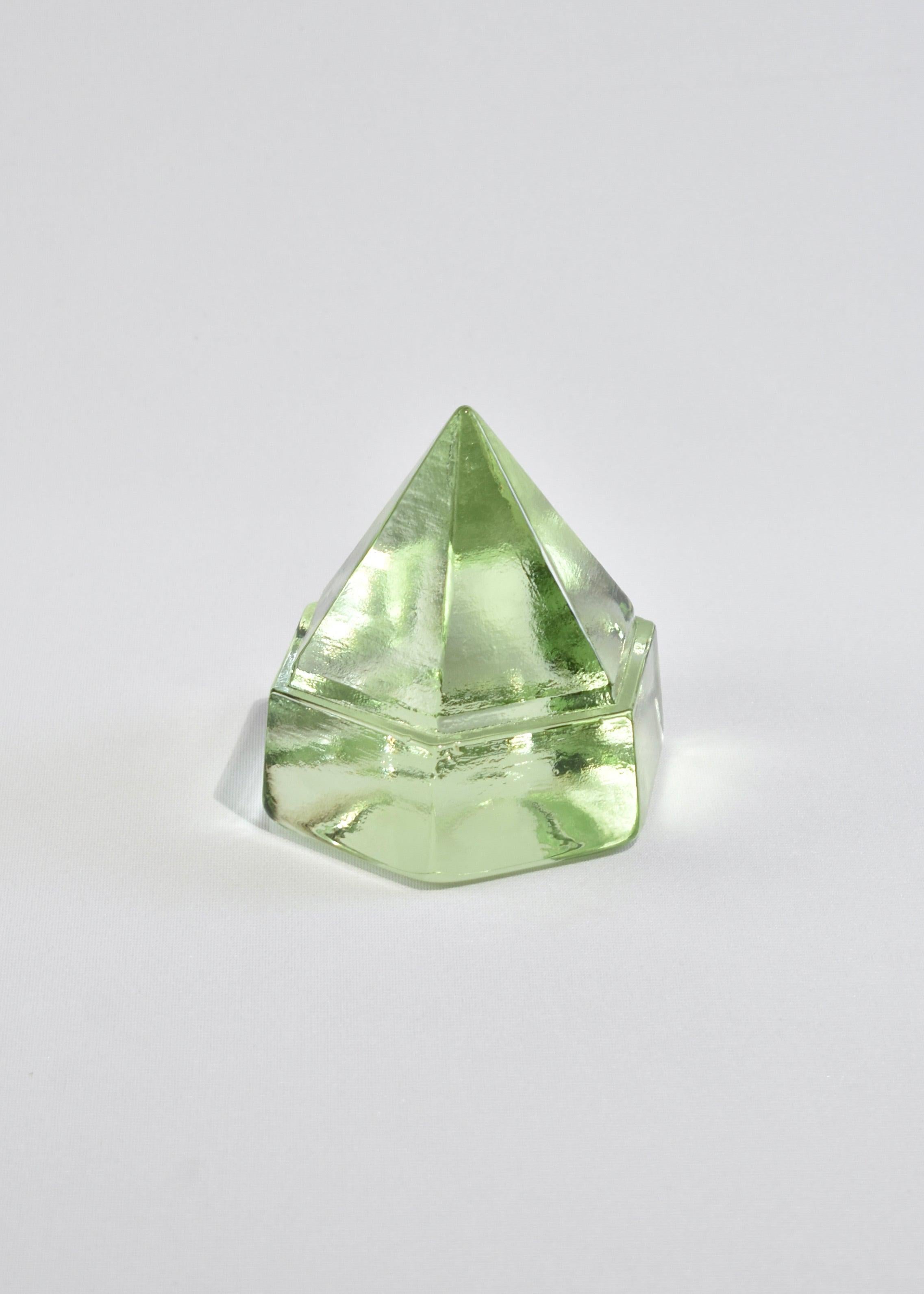 Beautiful light green glass prism. May be used as a paperweight or displayed on its own as a sculptural piece.