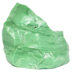 Escultura de vidrio verde