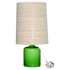 Lampe de table en verre vert