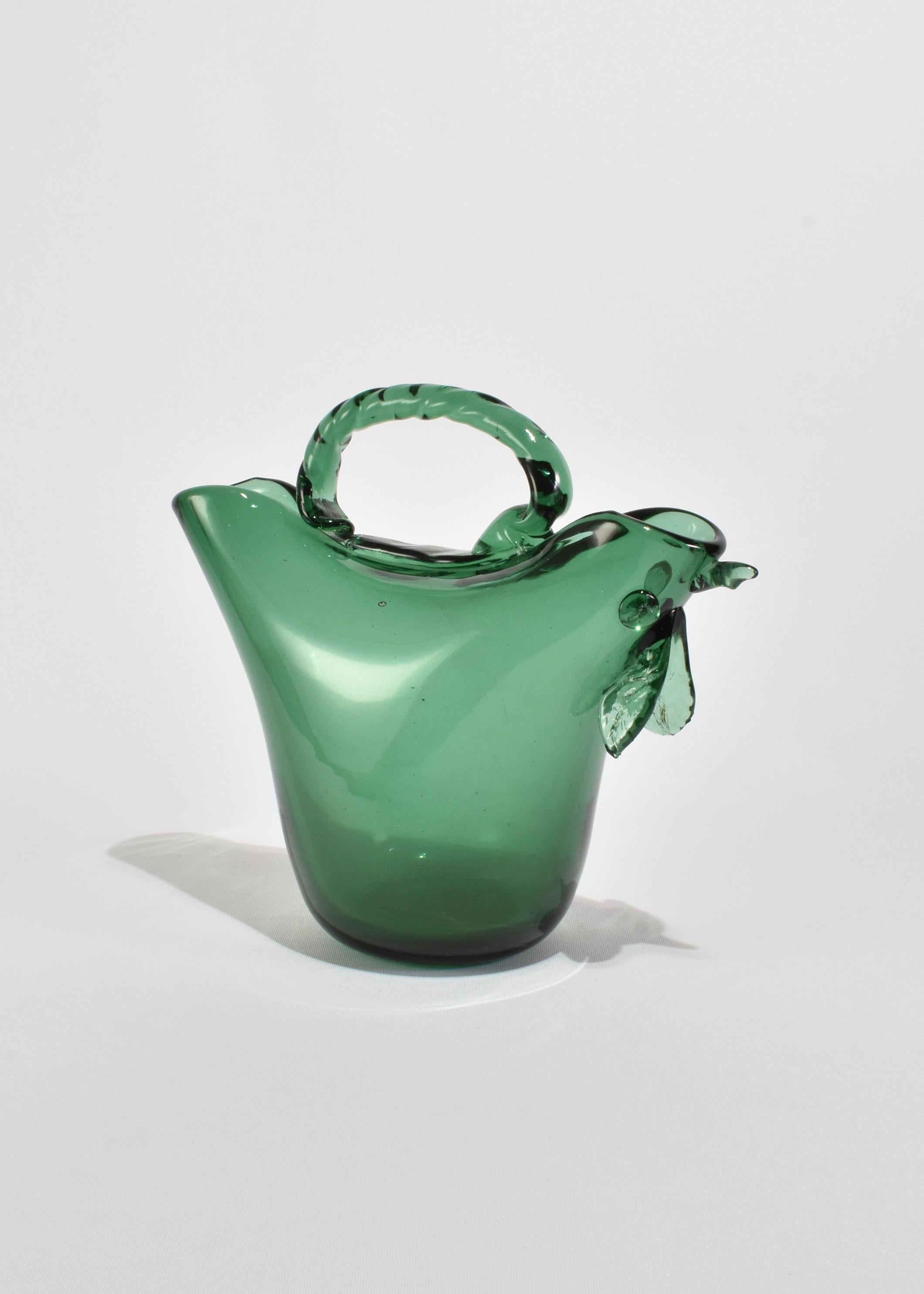Stunning, two spout blown glass vase or pitcher in green with bird detail on one side and a twisted handle. 